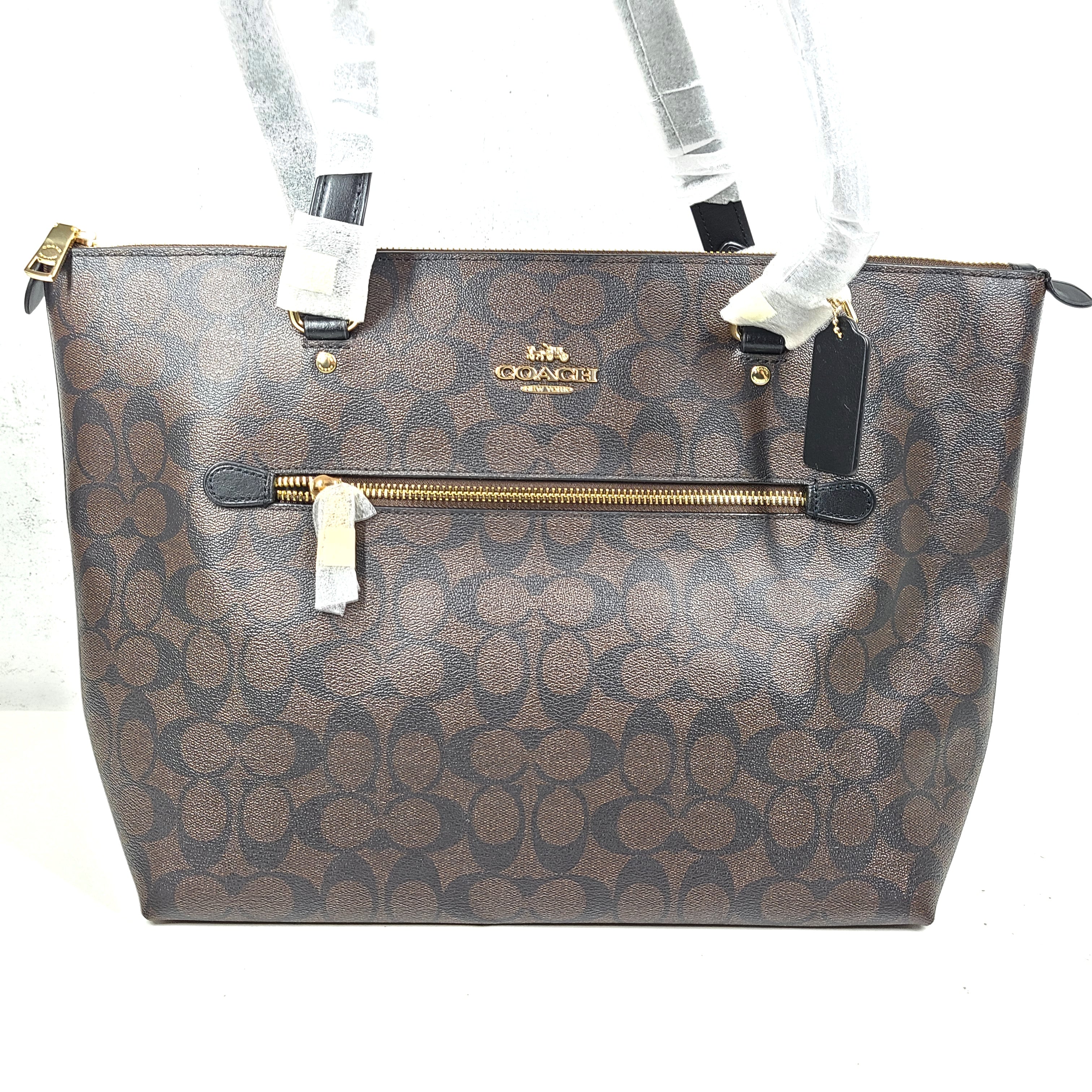 Brown Coach Gallery Tote with gold zip, black trim