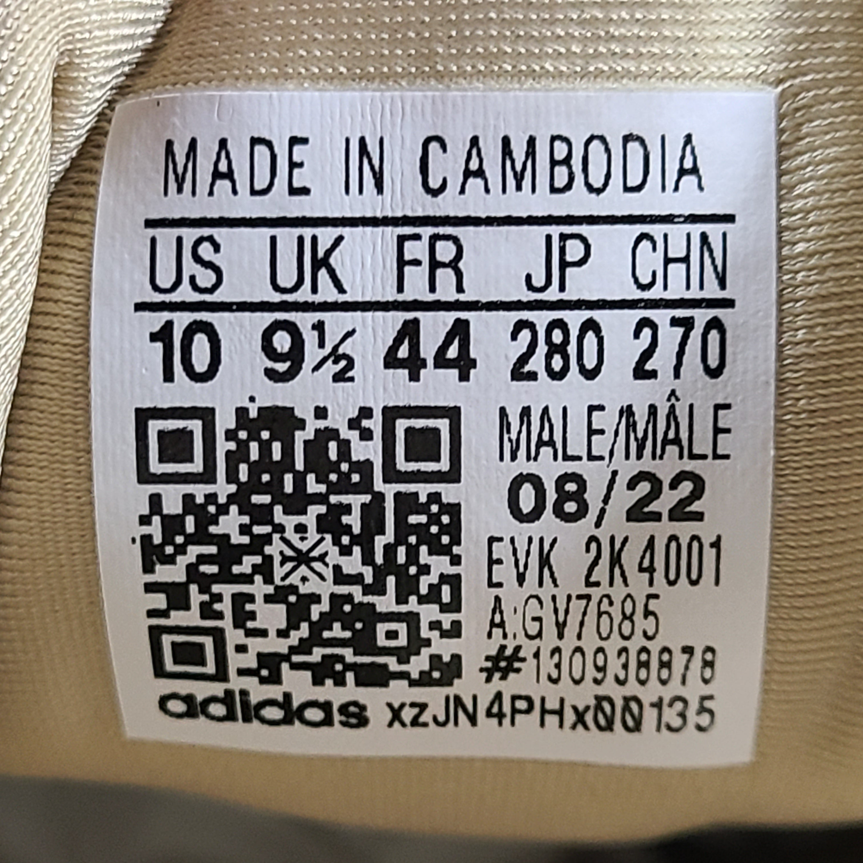 A pair of beige Adidas AdiPRENE GV7685 sneakers in size 10.
