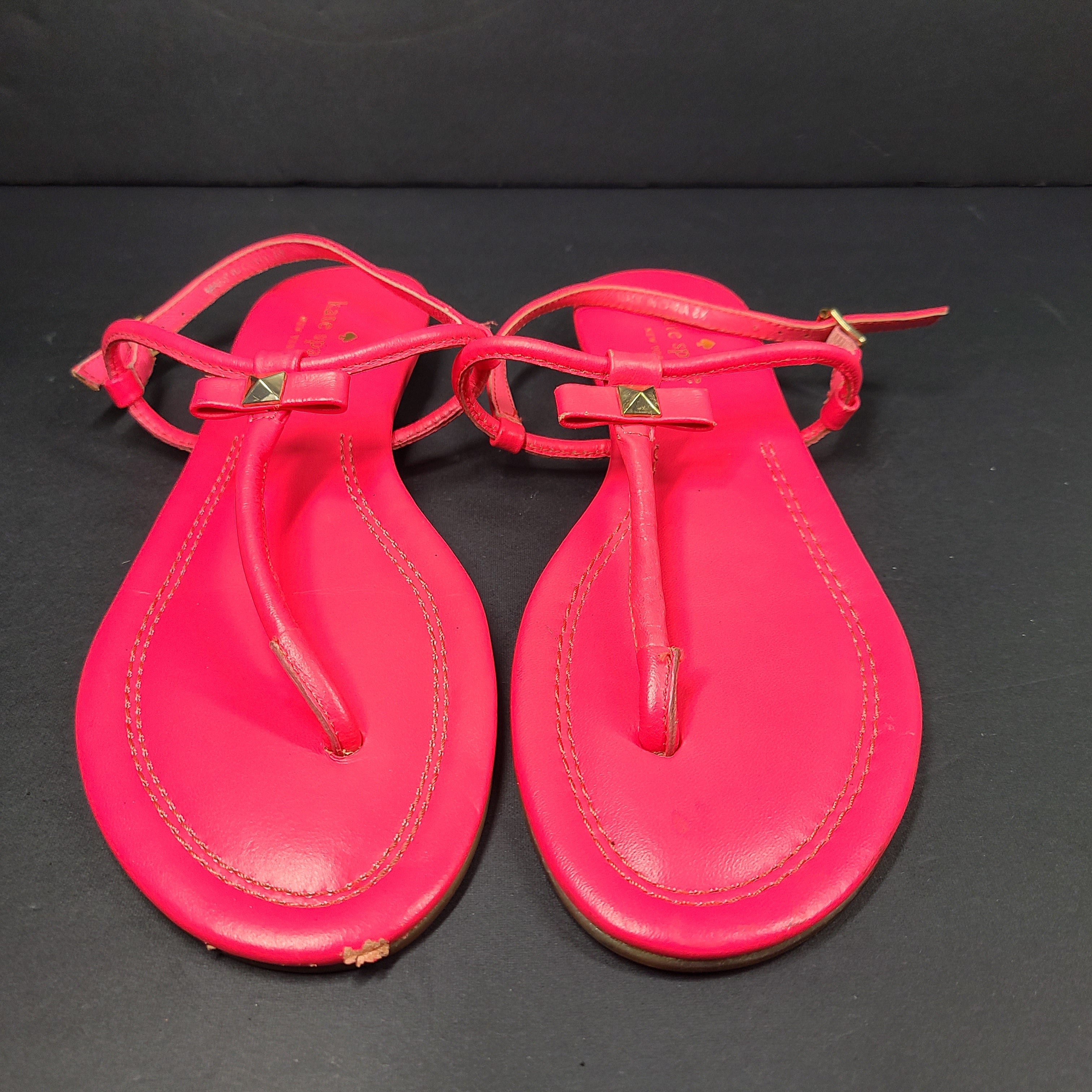 A pair of pink Kate Spade New York sandals