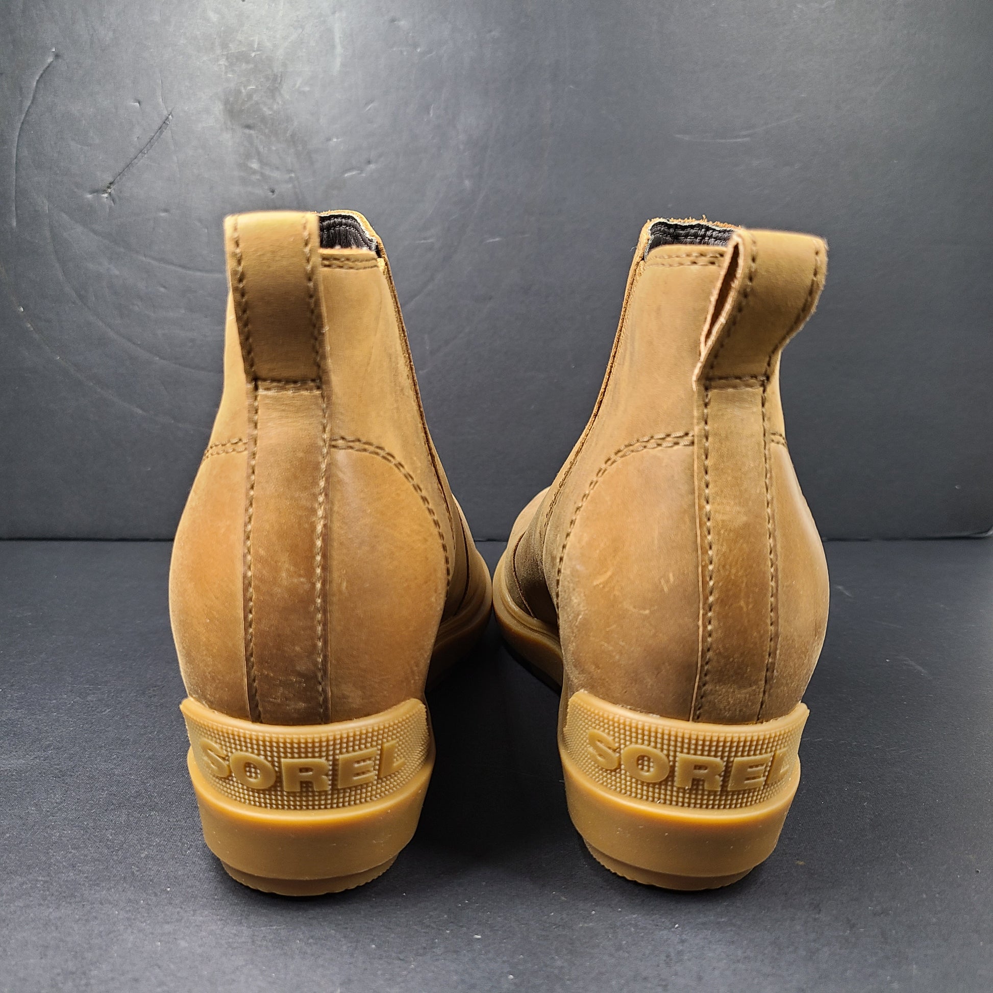 A pair of tan Sorel Chelsea boots for women in size 7.5