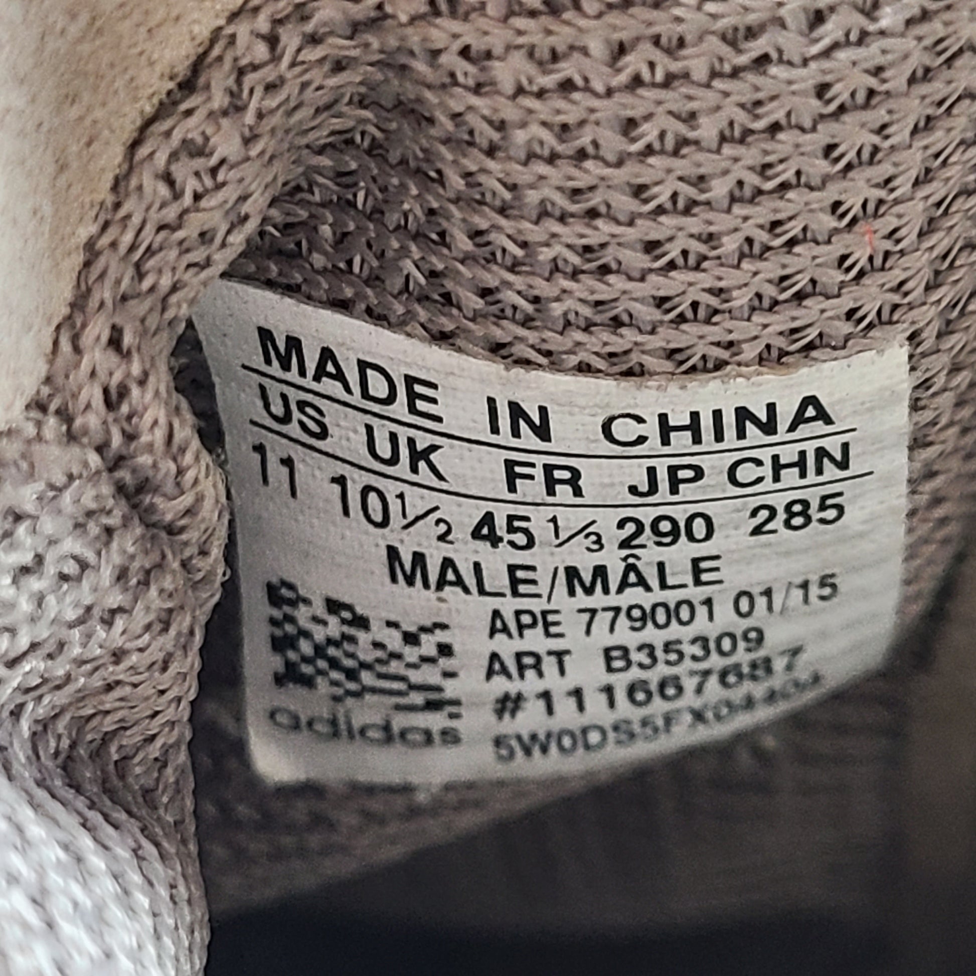 A pair of men's Adidas Yeezy Boost 750 Light Brown sneakers in size 11.