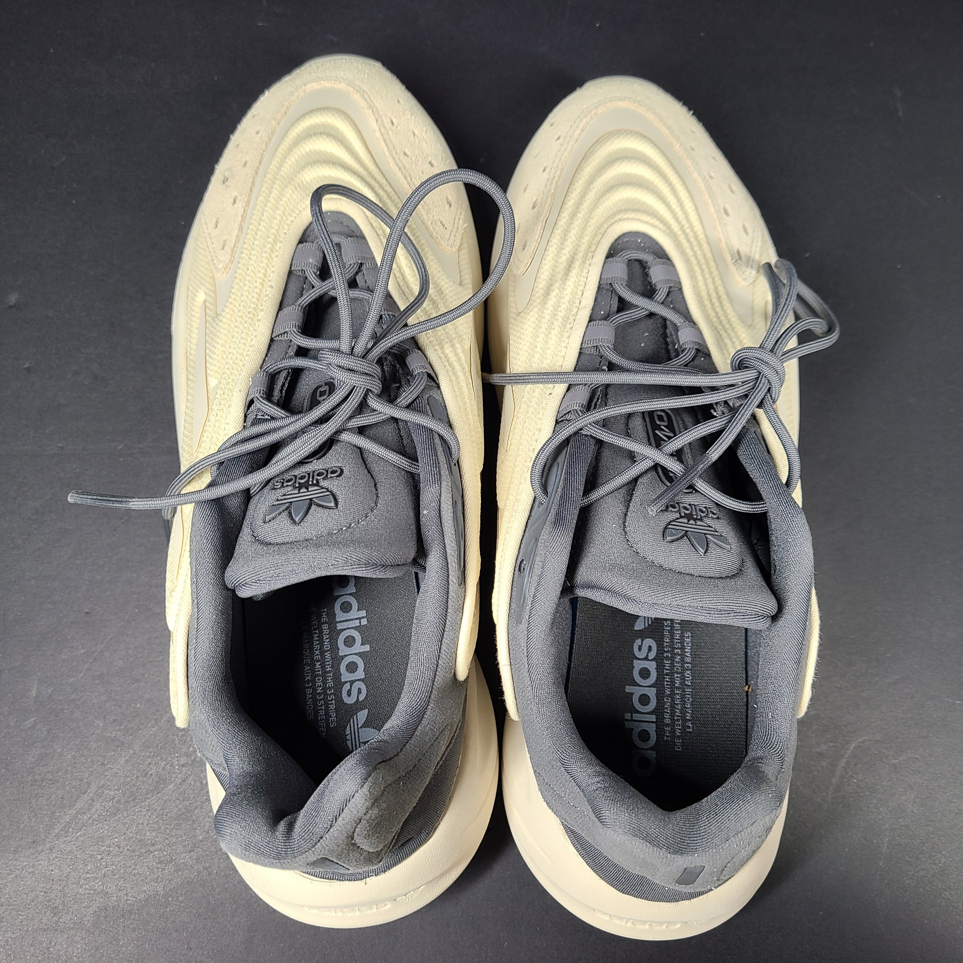 A pair of men's Adidas sneakers in size 9.5