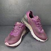 A pair of purple Under Armour HOVR Sonic 4 running shoes for women size 5.