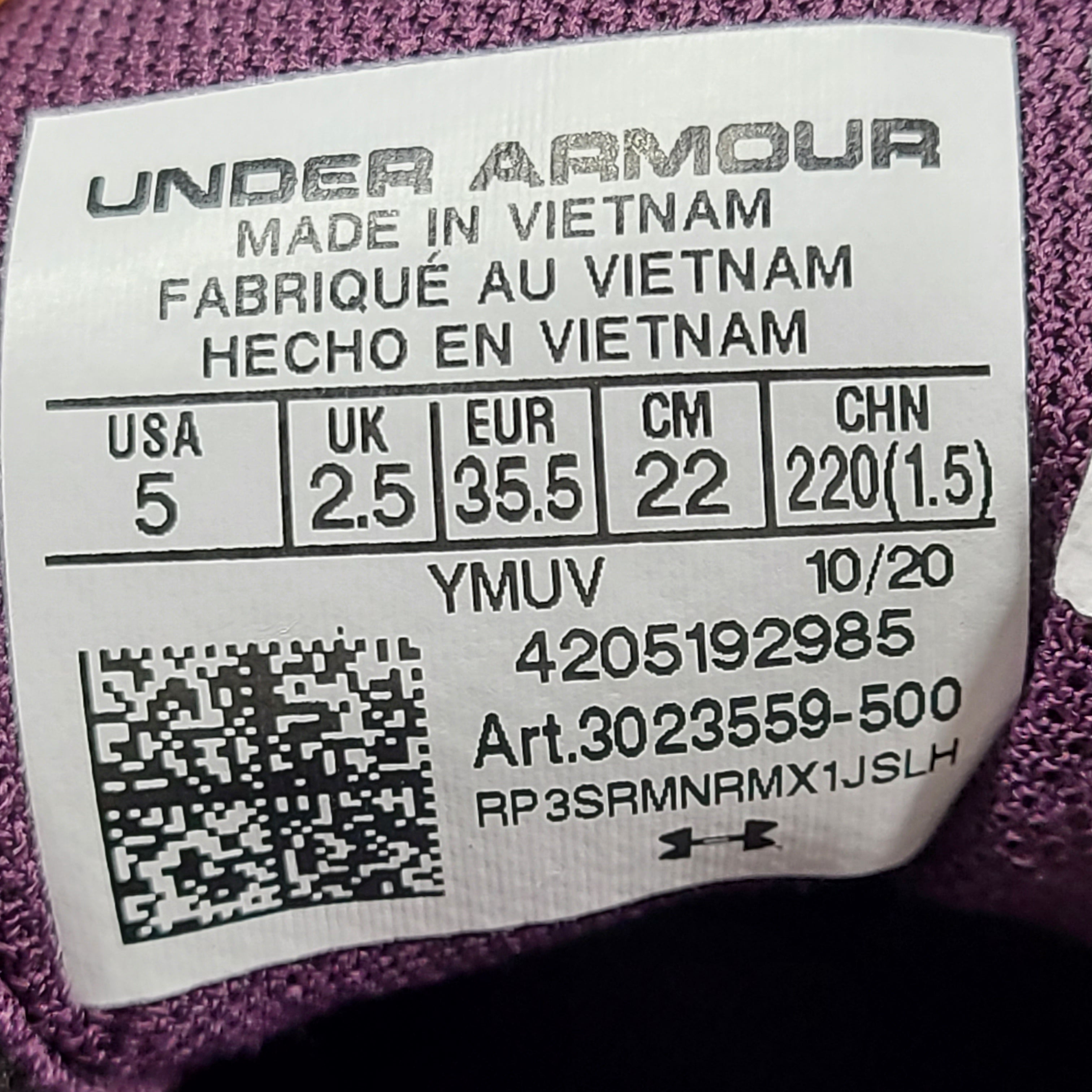 A pair of purple Under Armour HOVR Sonic 4 running shoes for women size 5.