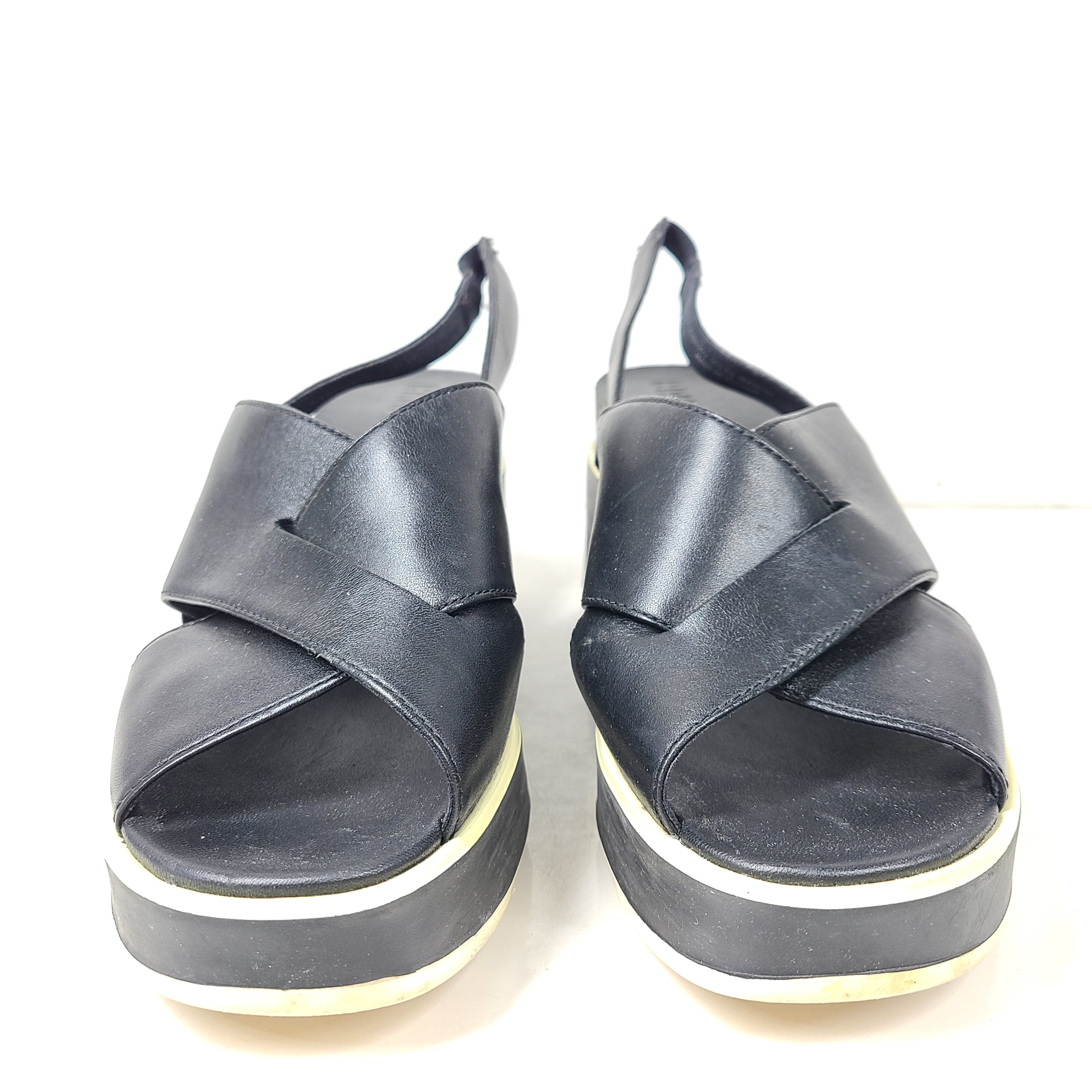 A pair of black Camper women's slingback platform sandals in size 38.