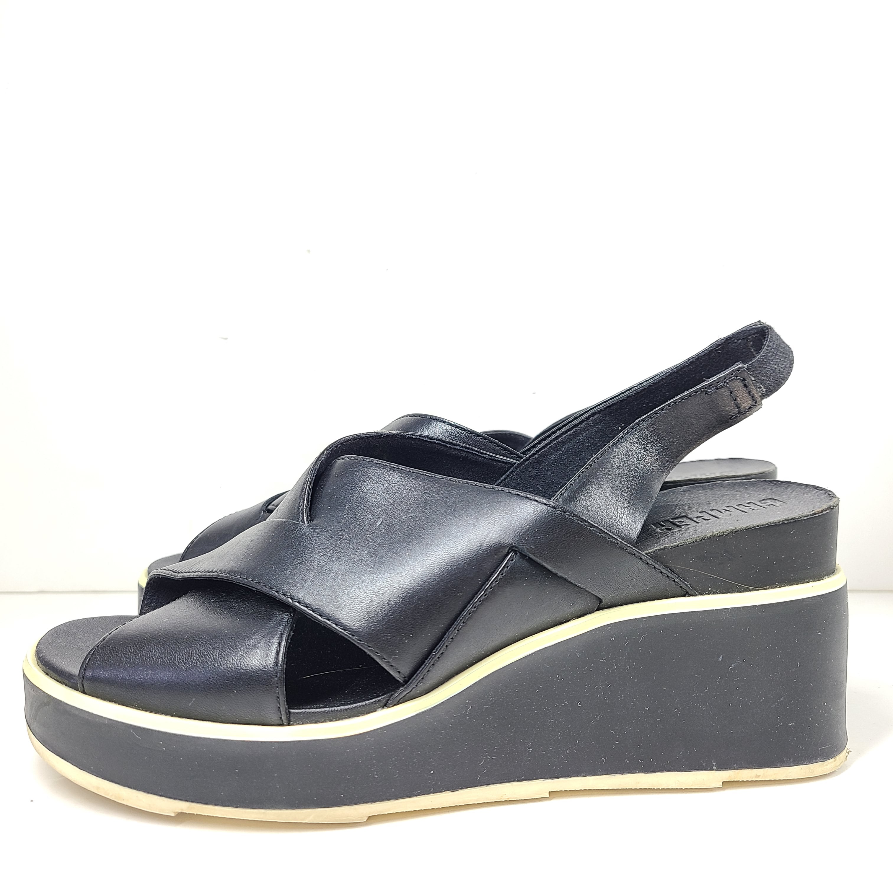 A pair of black Camper women's slingback platform sandals in size 38.