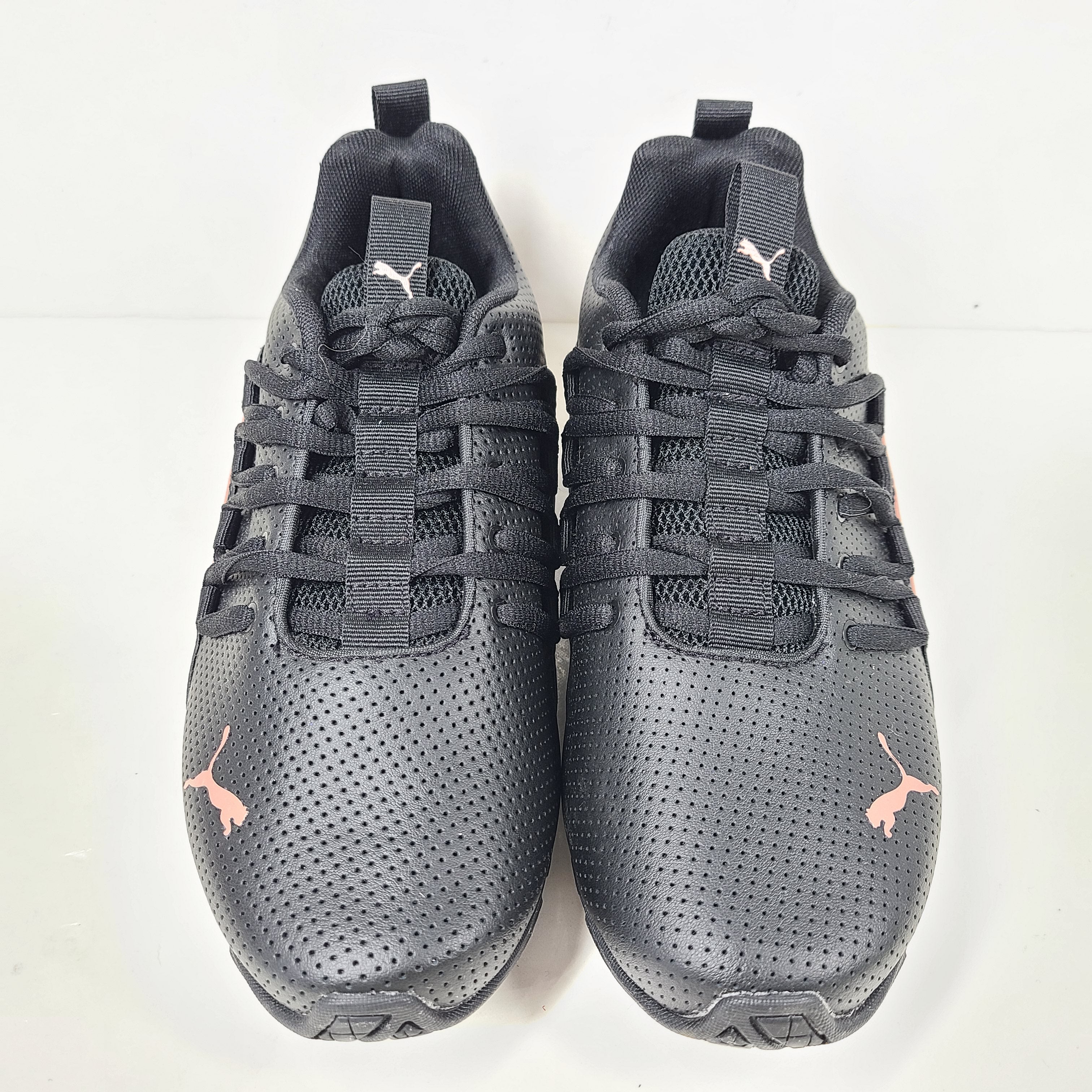 A pair of black and pink Puma Women's Training Shoes