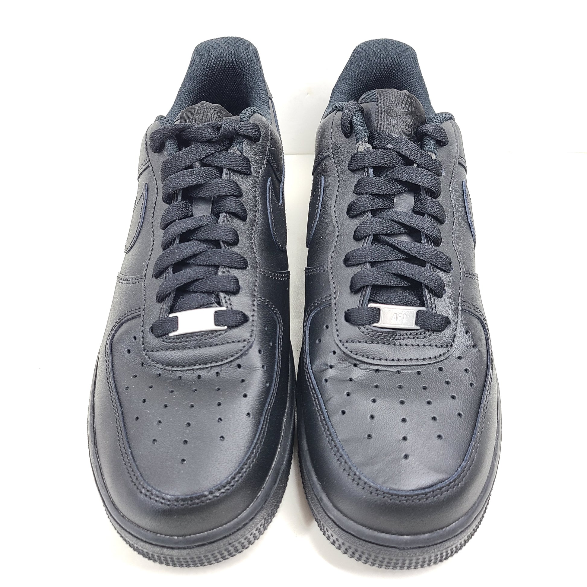 A pair of black Nike Air Force 1 Low sneakers for men