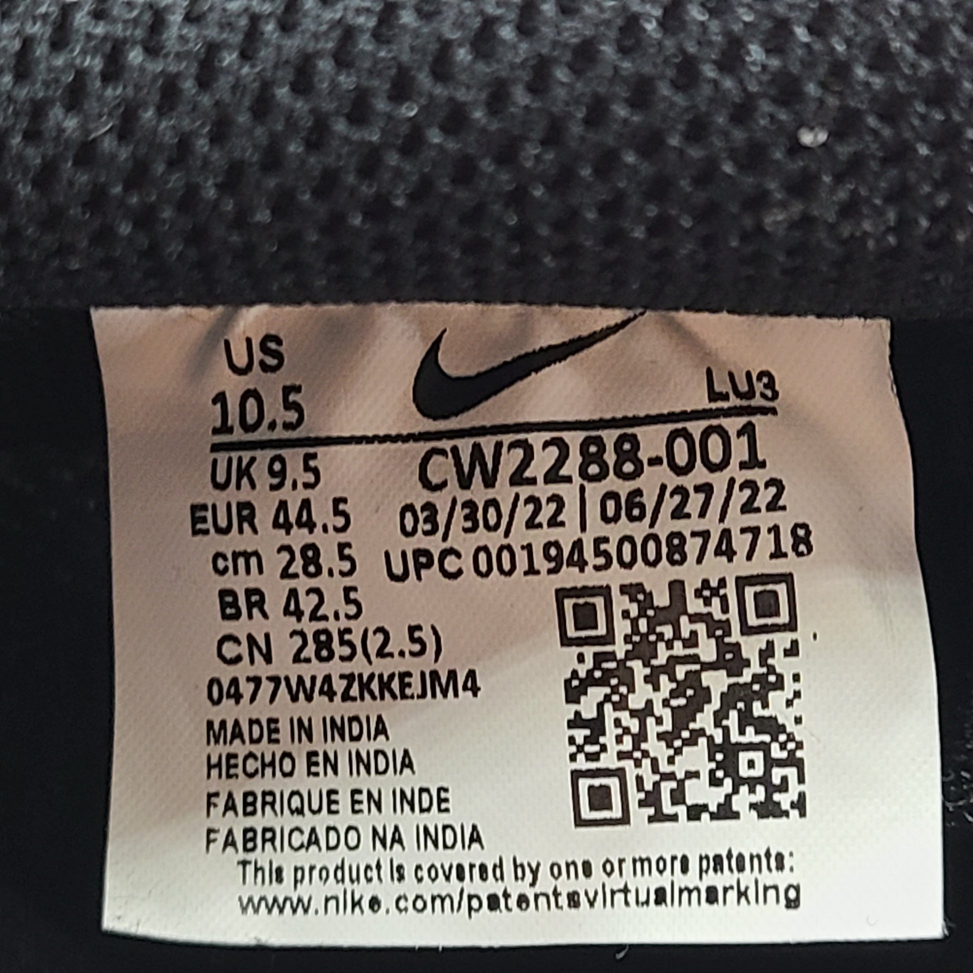 A pair of black Nike Air Force 1 Low sneakers for men