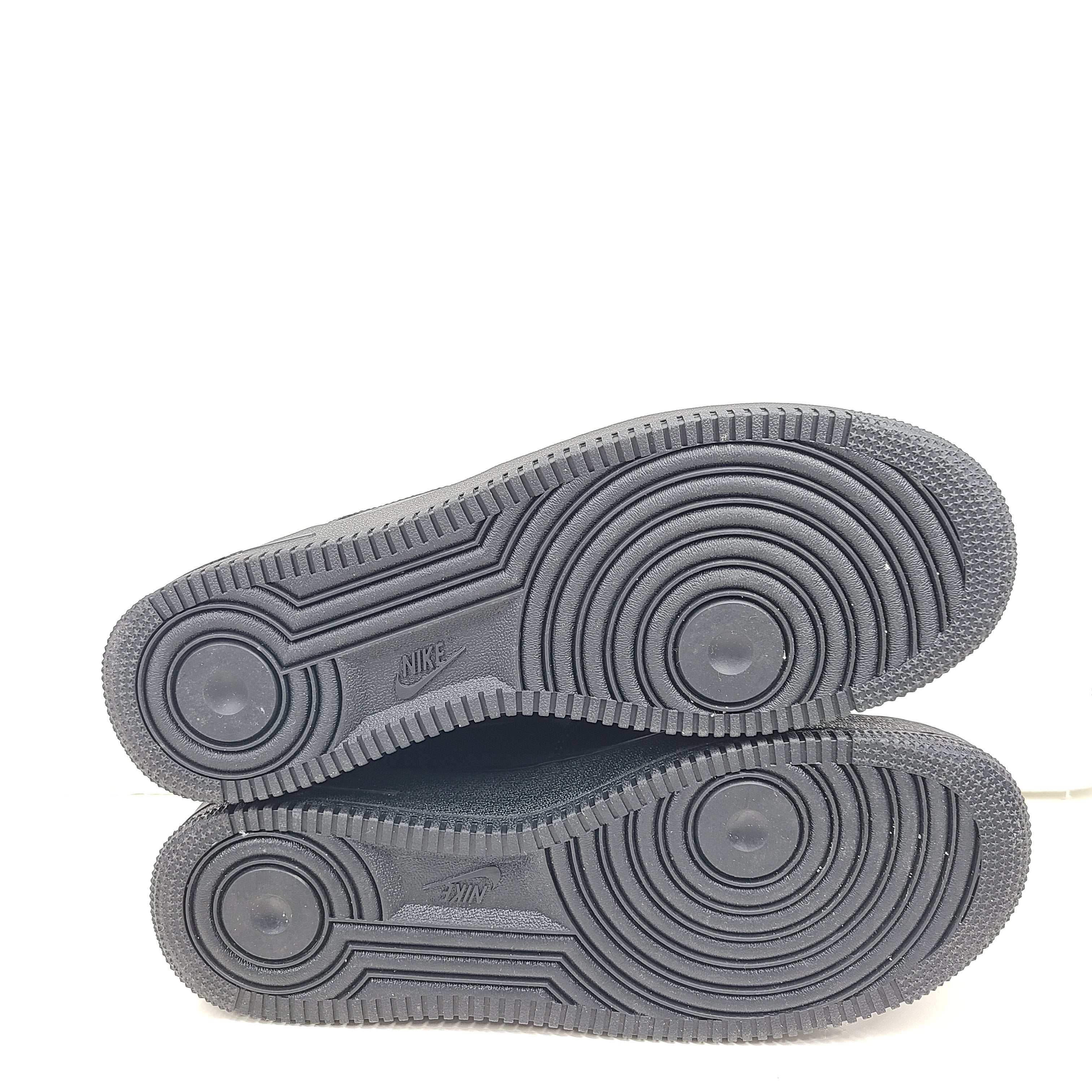 A pair of black Nike Air Force 1 Low sneakers for men