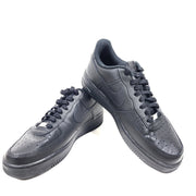 A pair of black Nike Air Force 1 Low sneakers for men