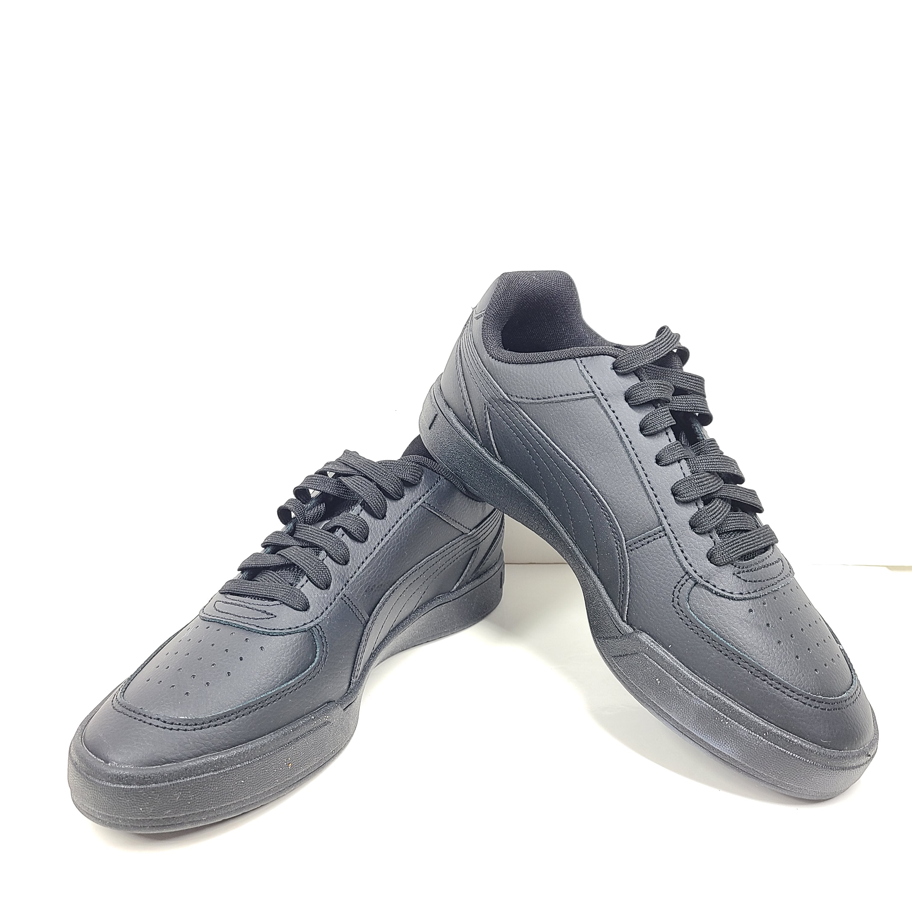 A pair of black men's Puma SoftFoam shoes