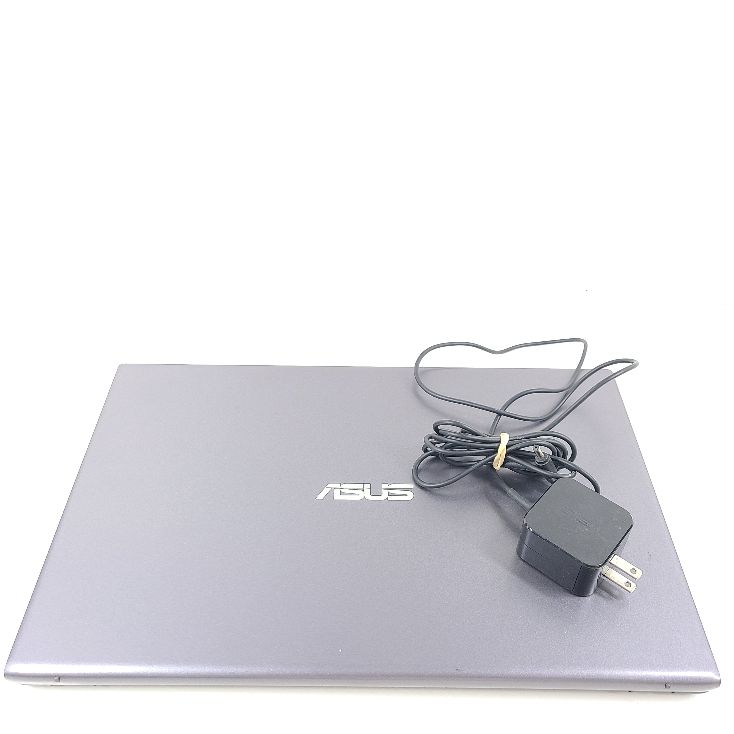 A sleek ASUS VivoBook X512FA 15.6" laptop with Intel i5 processor and 512GB SSD
