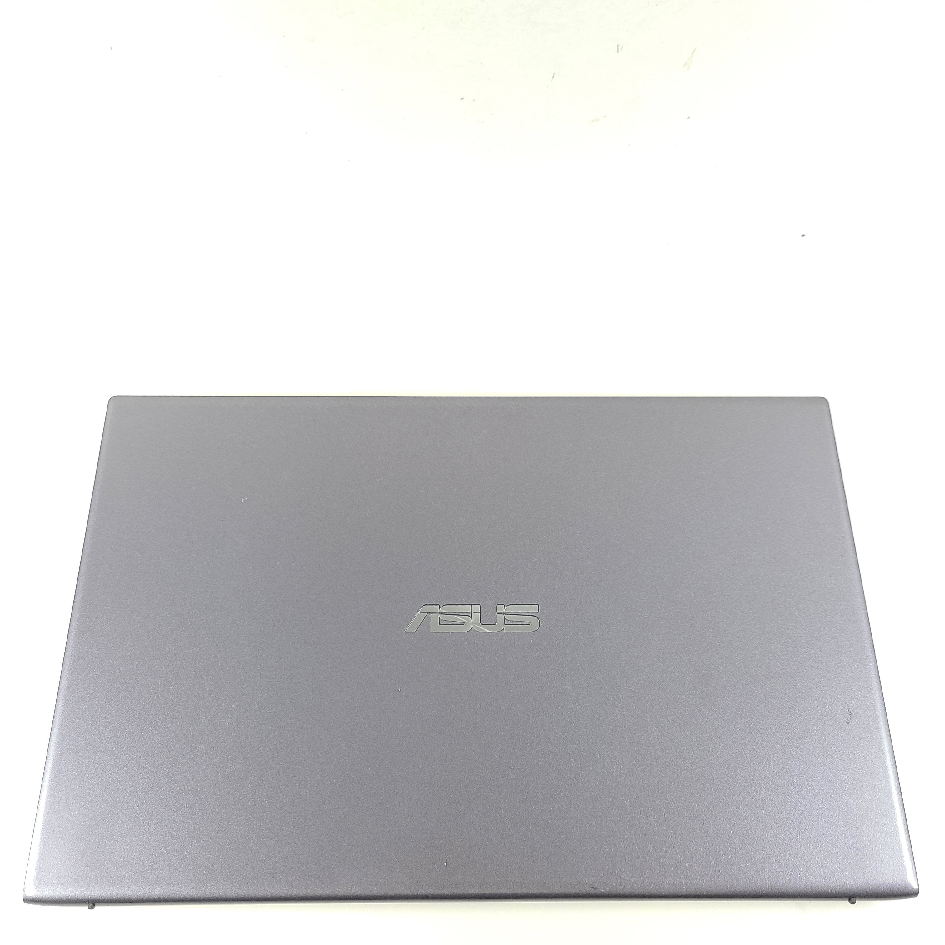 A sleek ASUS VivoBook X512FA 15.6" laptop with Intel i5 processor and 512GB SSD