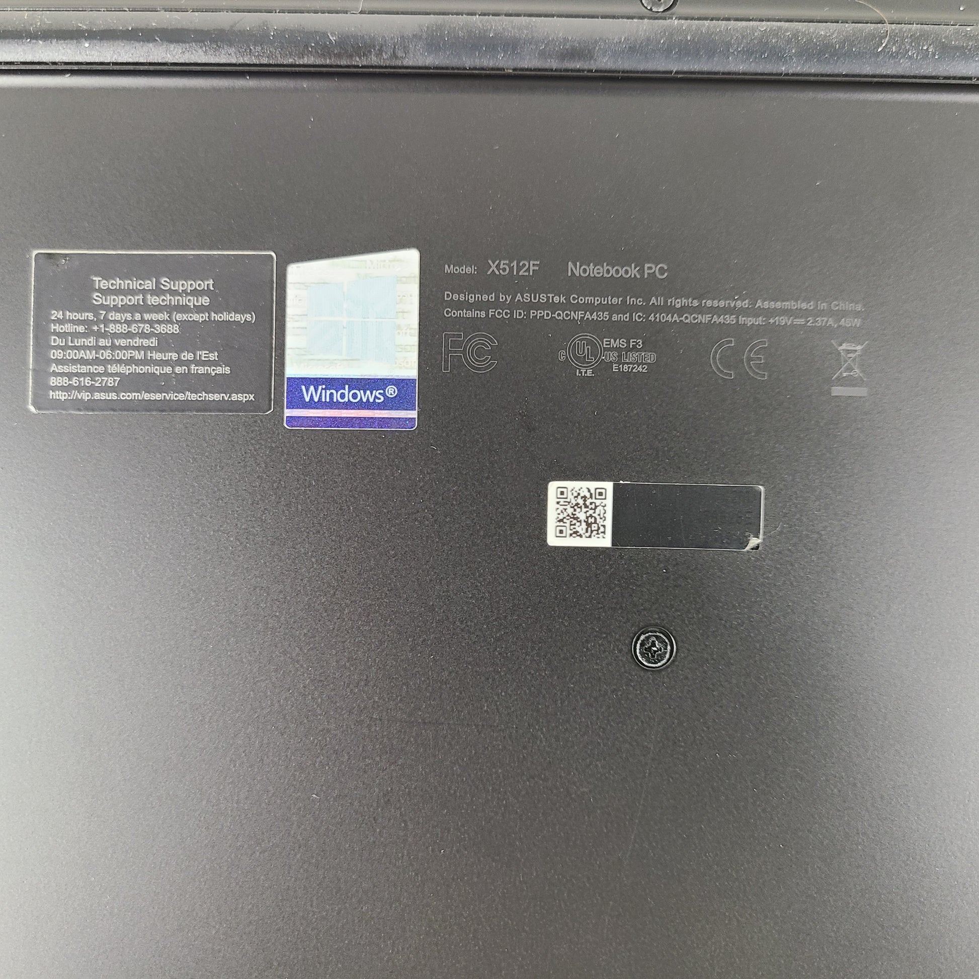 A sleek ASUS VivoBook X512FA 15.6" laptop with Intel i5 processor and 512GB SSD