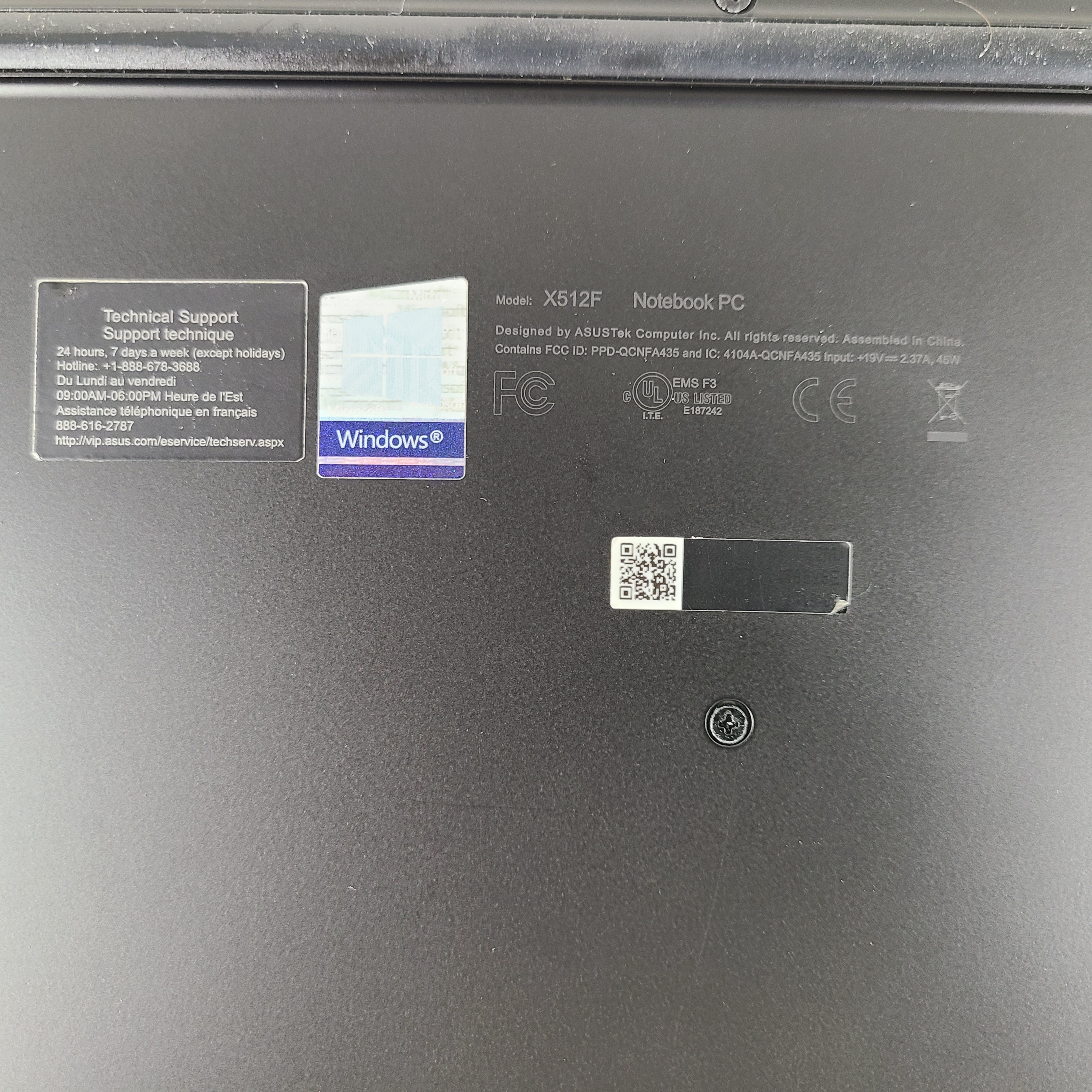 A sleek ASUS VivoBook X512FA 15.6" laptop with Intel i5 processor and 512GB SSD