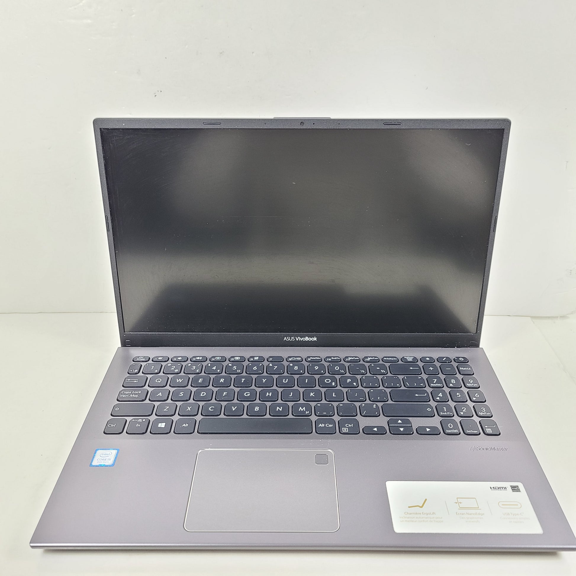 A sleek ASUS VivoBook X512FA 15.6" laptop with Intel i5 processor and 512GB SSD