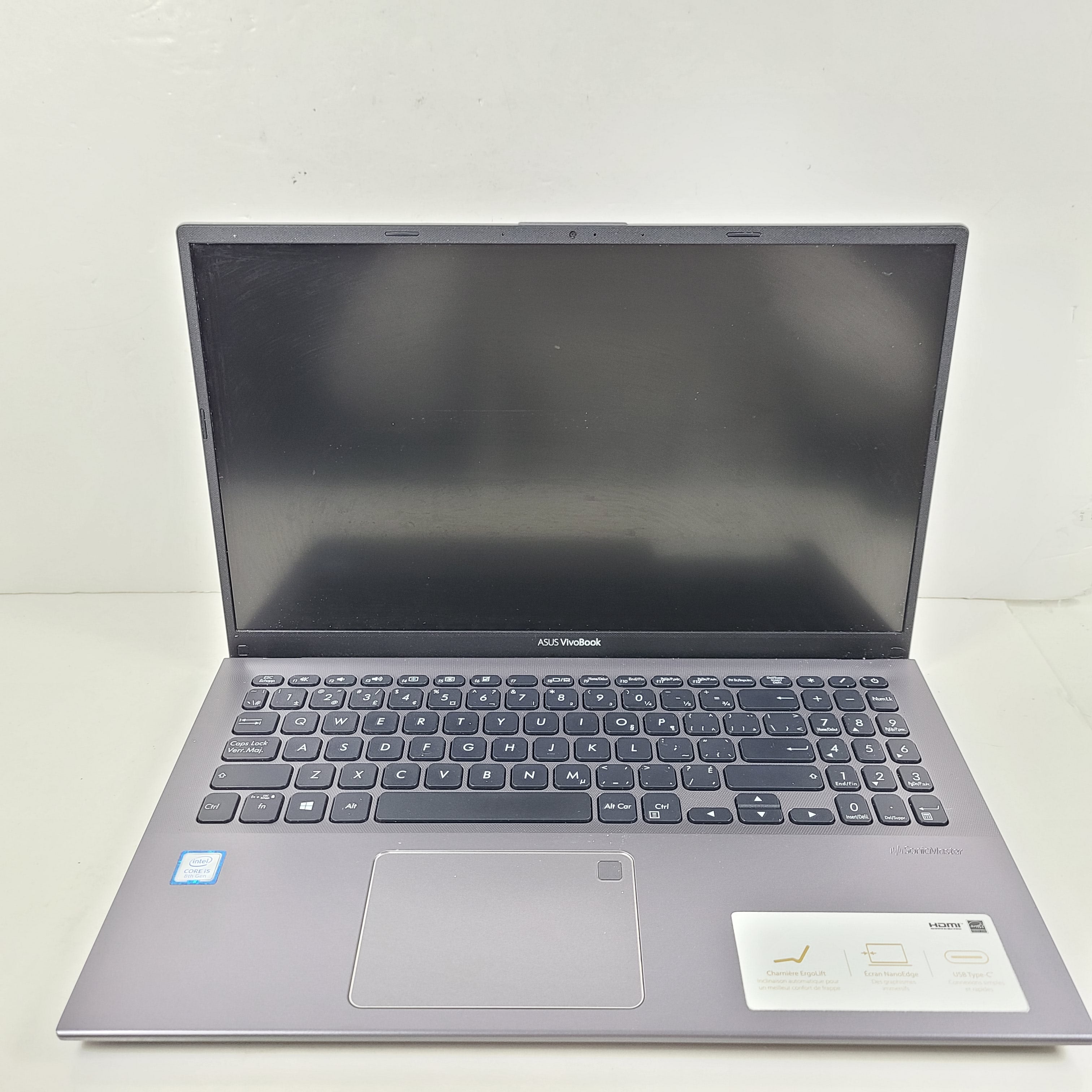A sleek ASUS VivoBook X512FA 15.6" laptop with Intel i5 processor and 512GB SSD