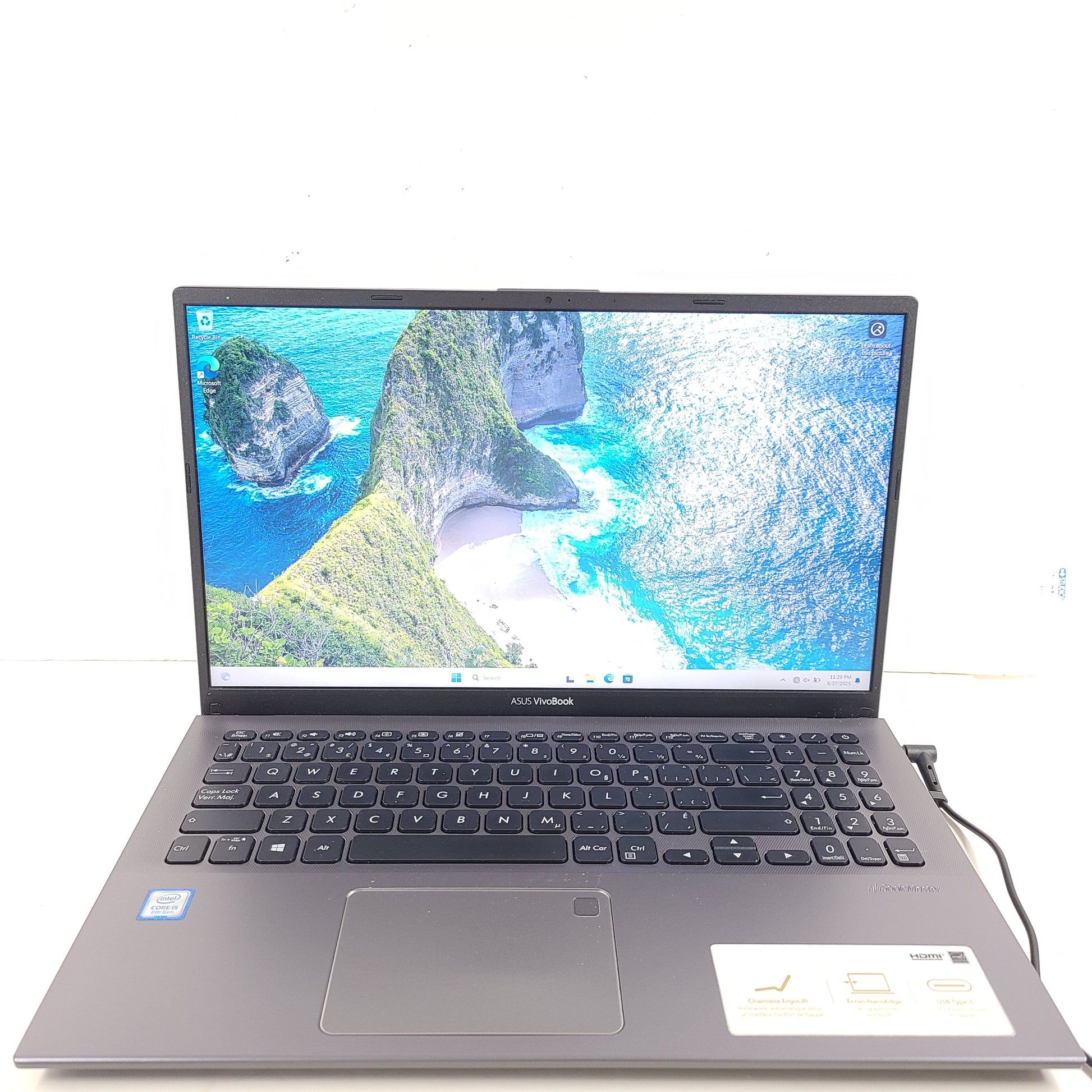 A sleek ASUS VivoBook X512FA 15.6" laptop with Intel i5 processor and 512GB SSD