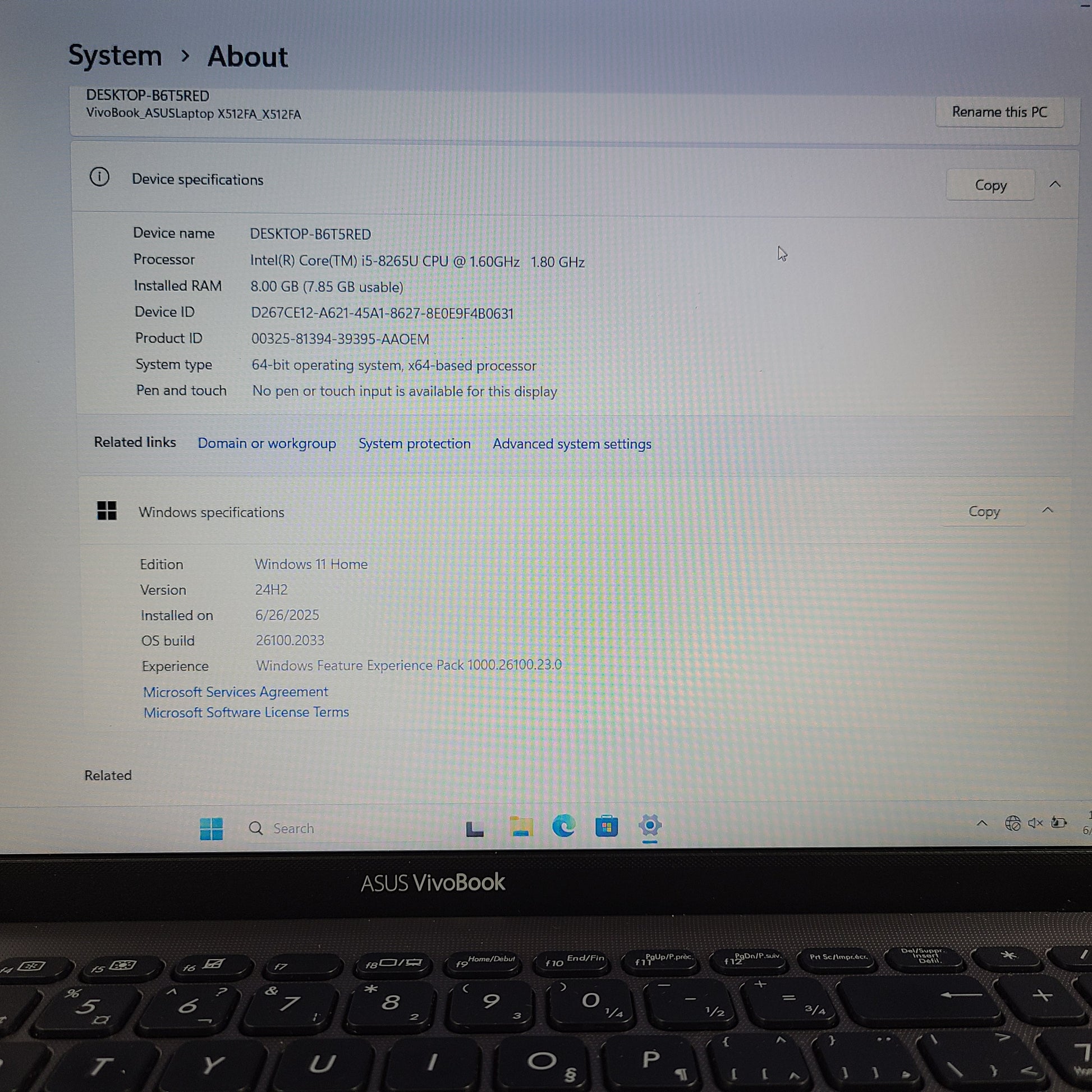 A sleek ASUS VivoBook X512FA 15.6" laptop with Intel i5 processor and 512GB SSD