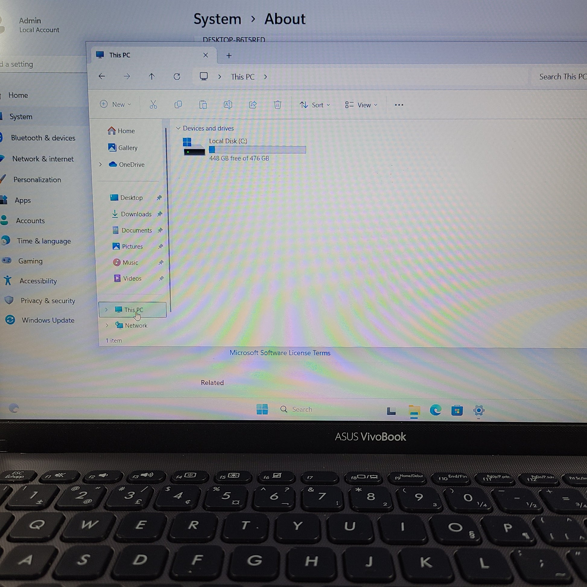 A sleek ASUS VivoBook X512FA 15.6" laptop with Intel i5 processor and 512GB SSD