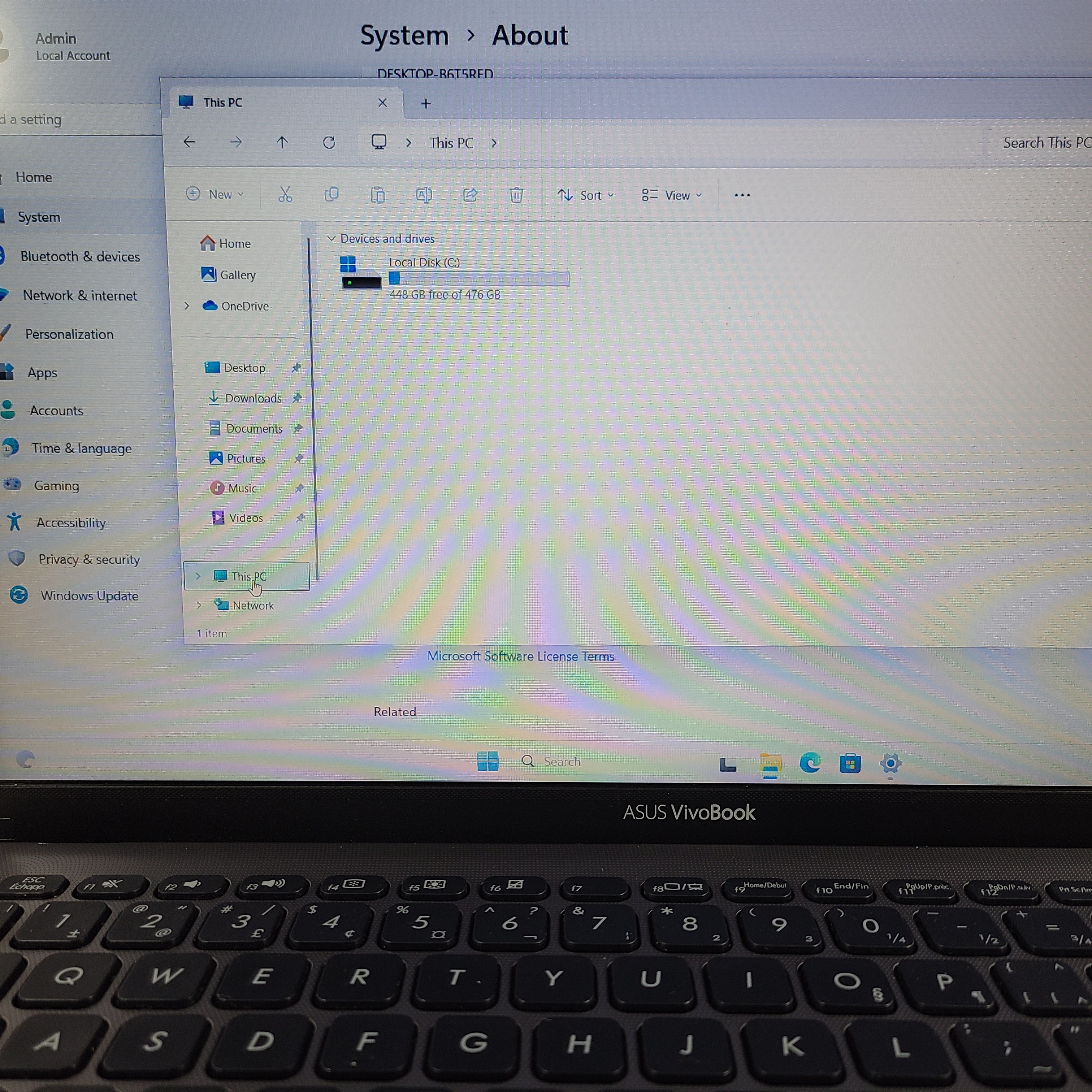 A sleek ASUS VivoBook X512FA 15.6" laptop with Intel i5 processor and 512GB SSD