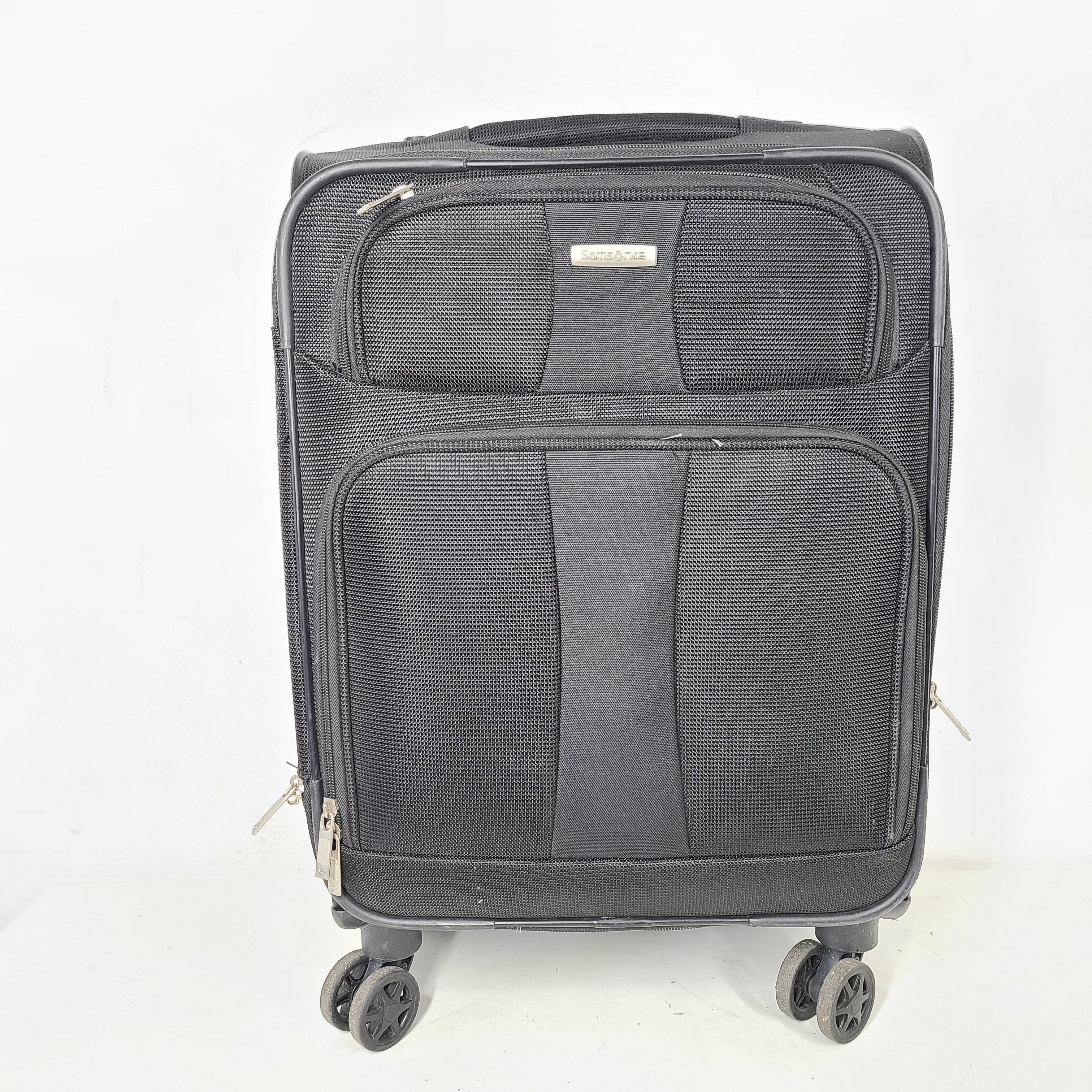 A black Samsonite spinner suitcase with model number NA01019309.