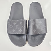 A pair of men's Louis Vuitton Monogram Slippers in size 9