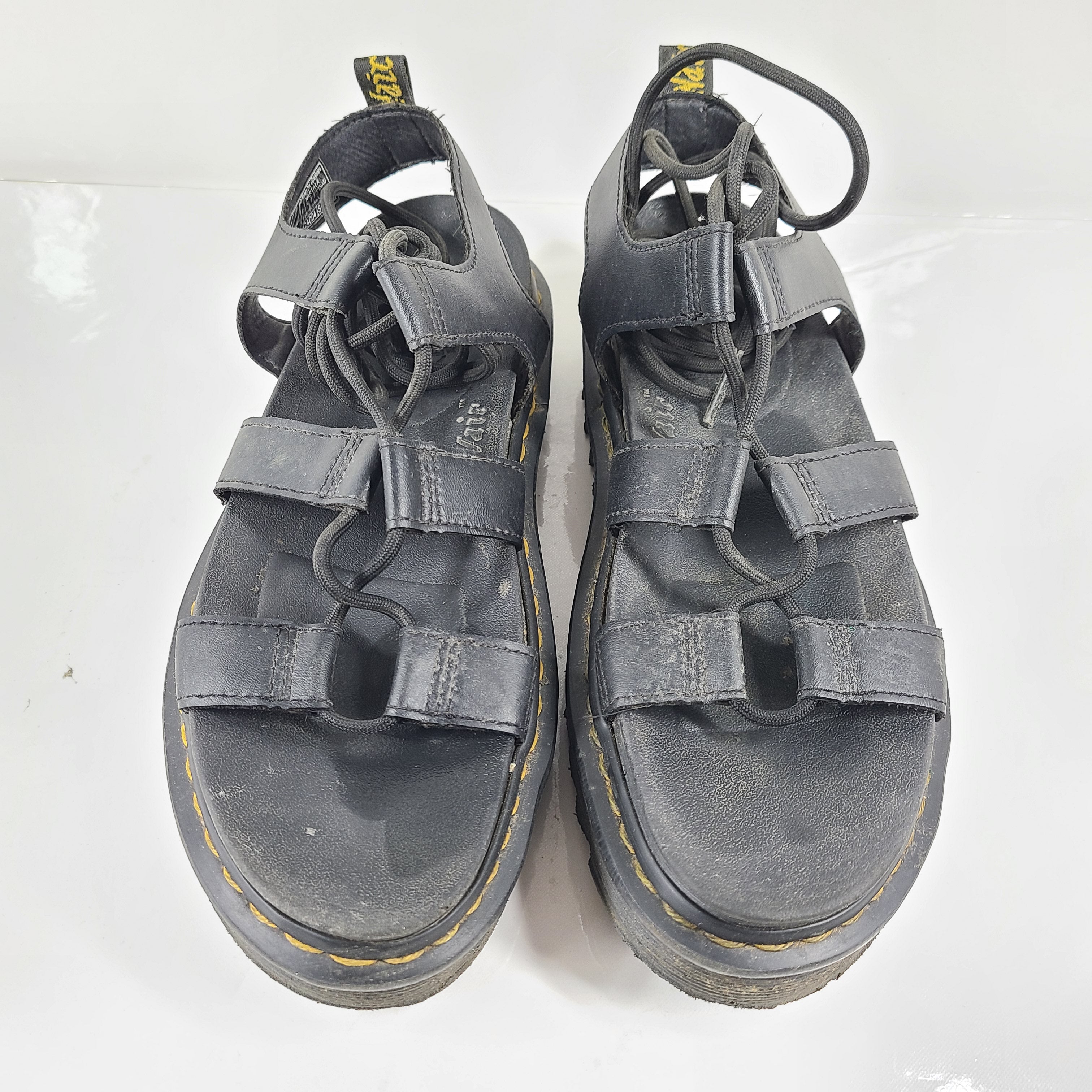 A pair of black Dr. Martens Nartilla sandals.