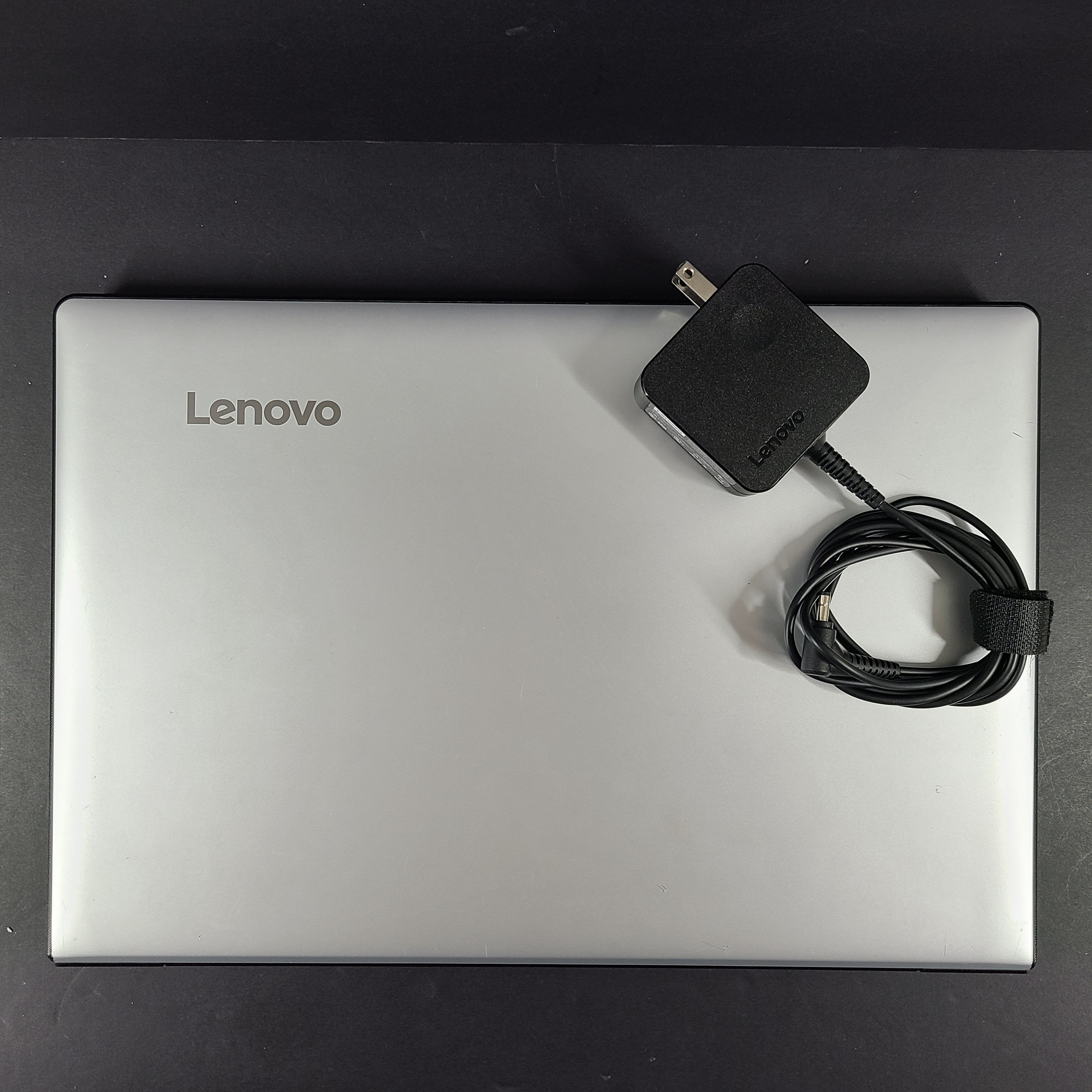 A pre-owned Lenovo Ideapad 310-15ISK 80SM laptop with Intel i5 processor and 8GB RAM.