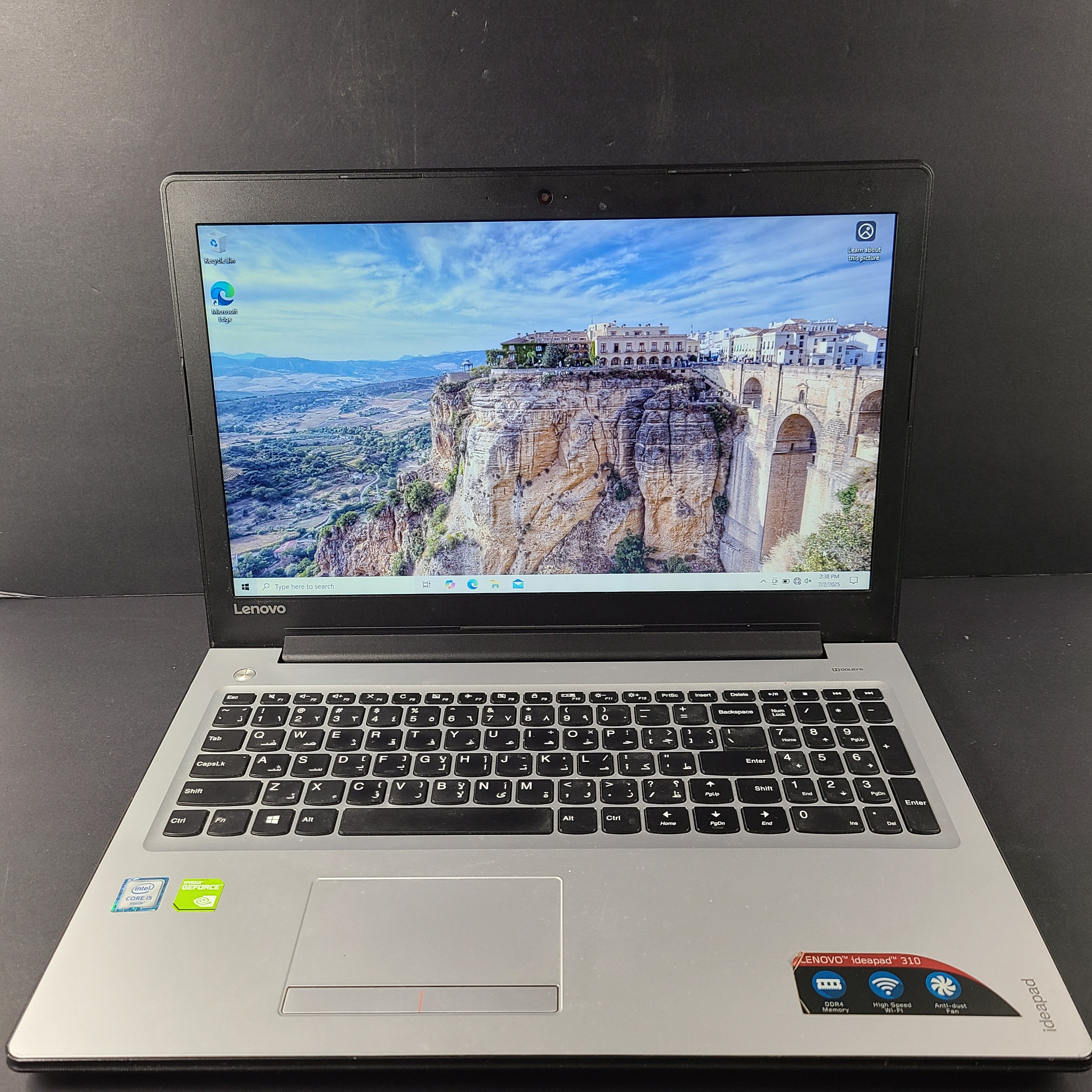 A pre-owned Lenovo Ideapad 310-15ISK 80SM laptop with Intel i5 processor and 8GB RAM.