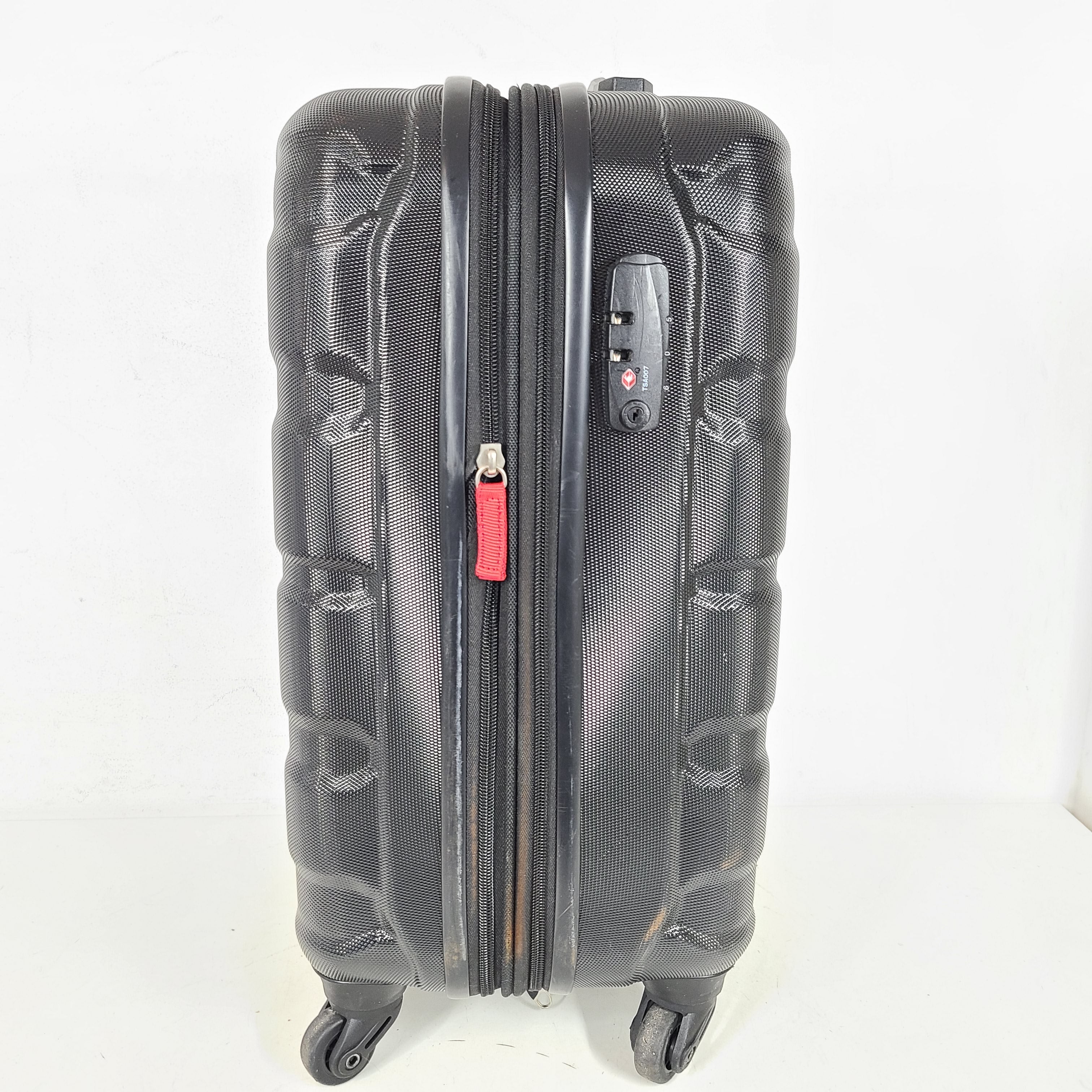 A black Samsonite spinner luggage.