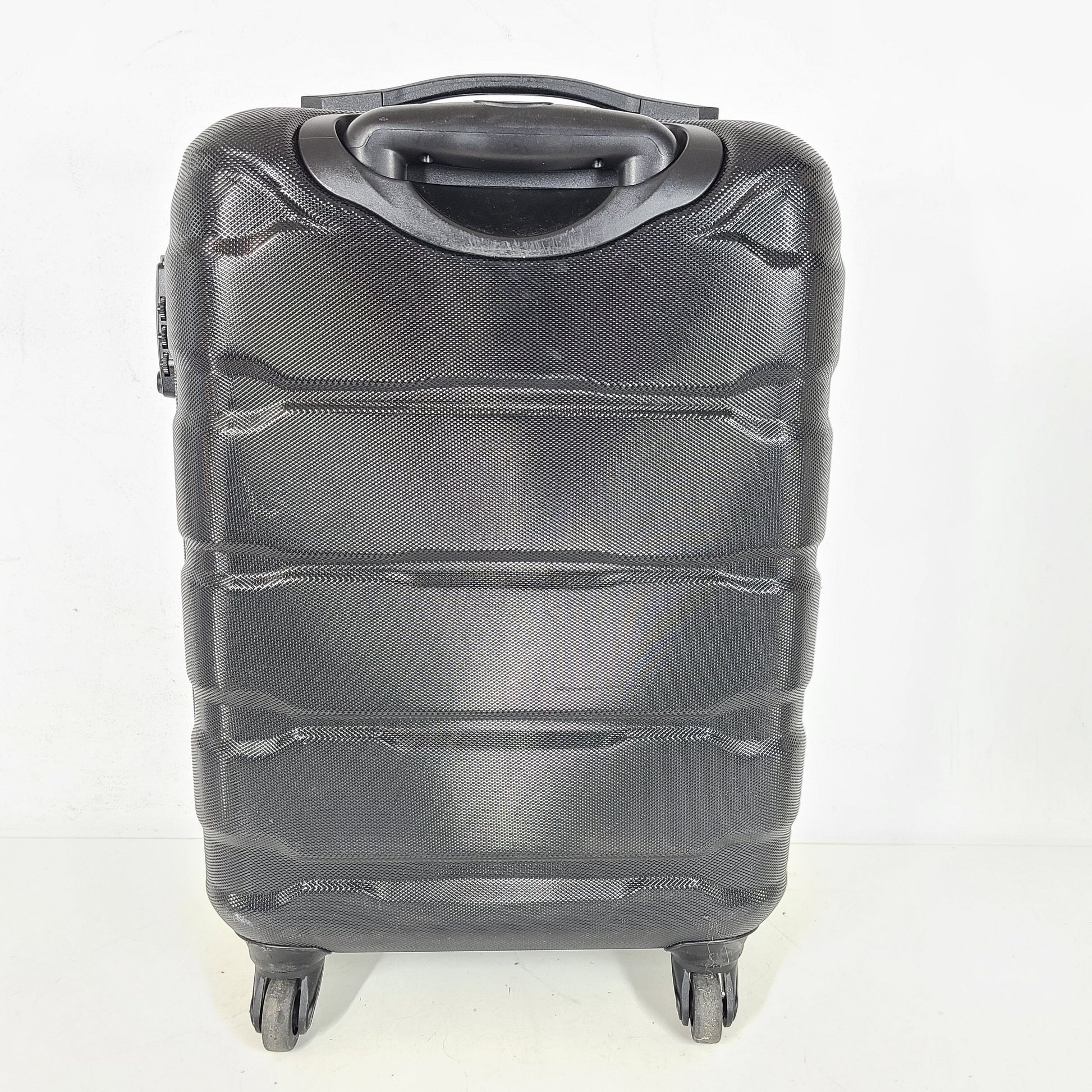 A black Samsonite spinner luggage.