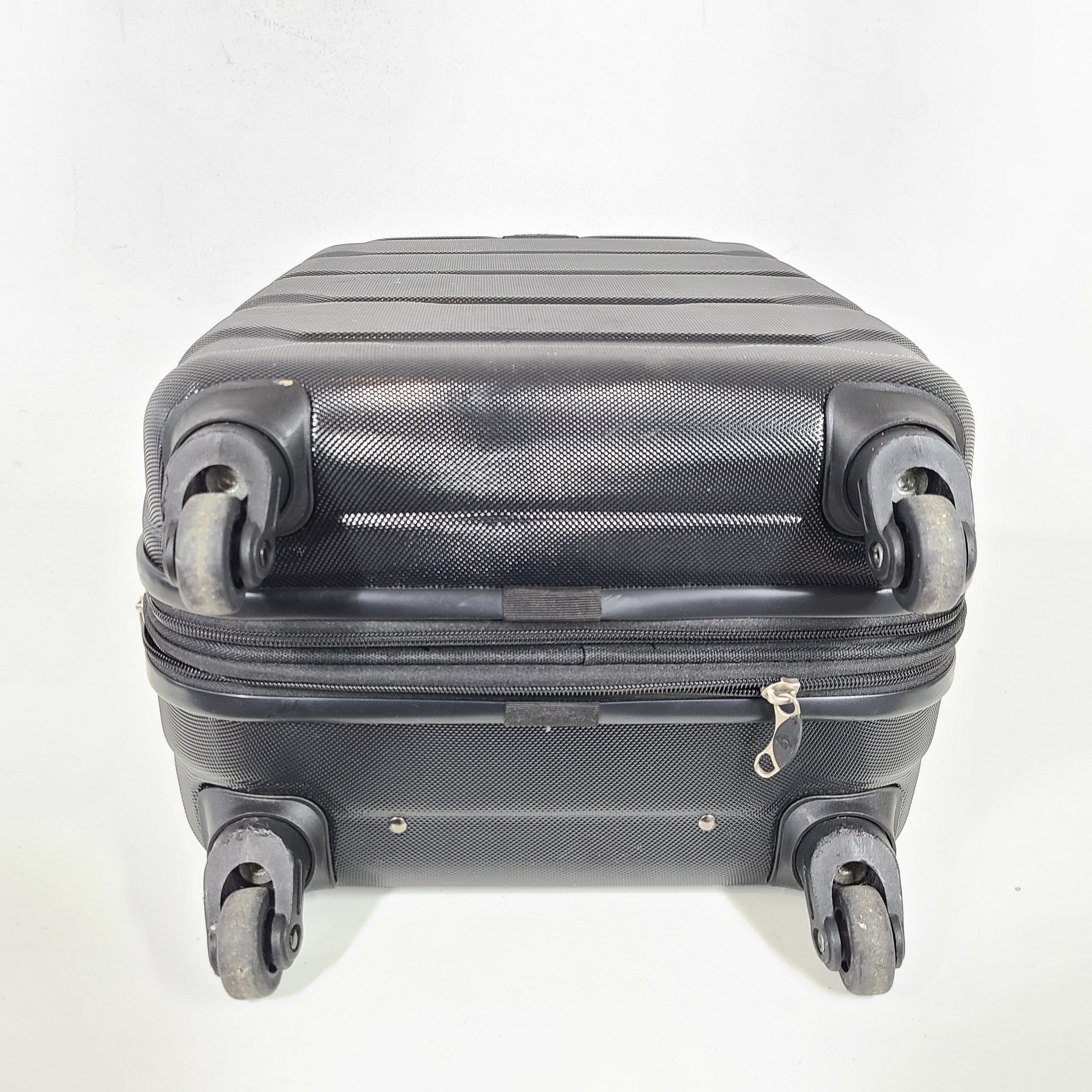 A black Samsonite spinner luggage.