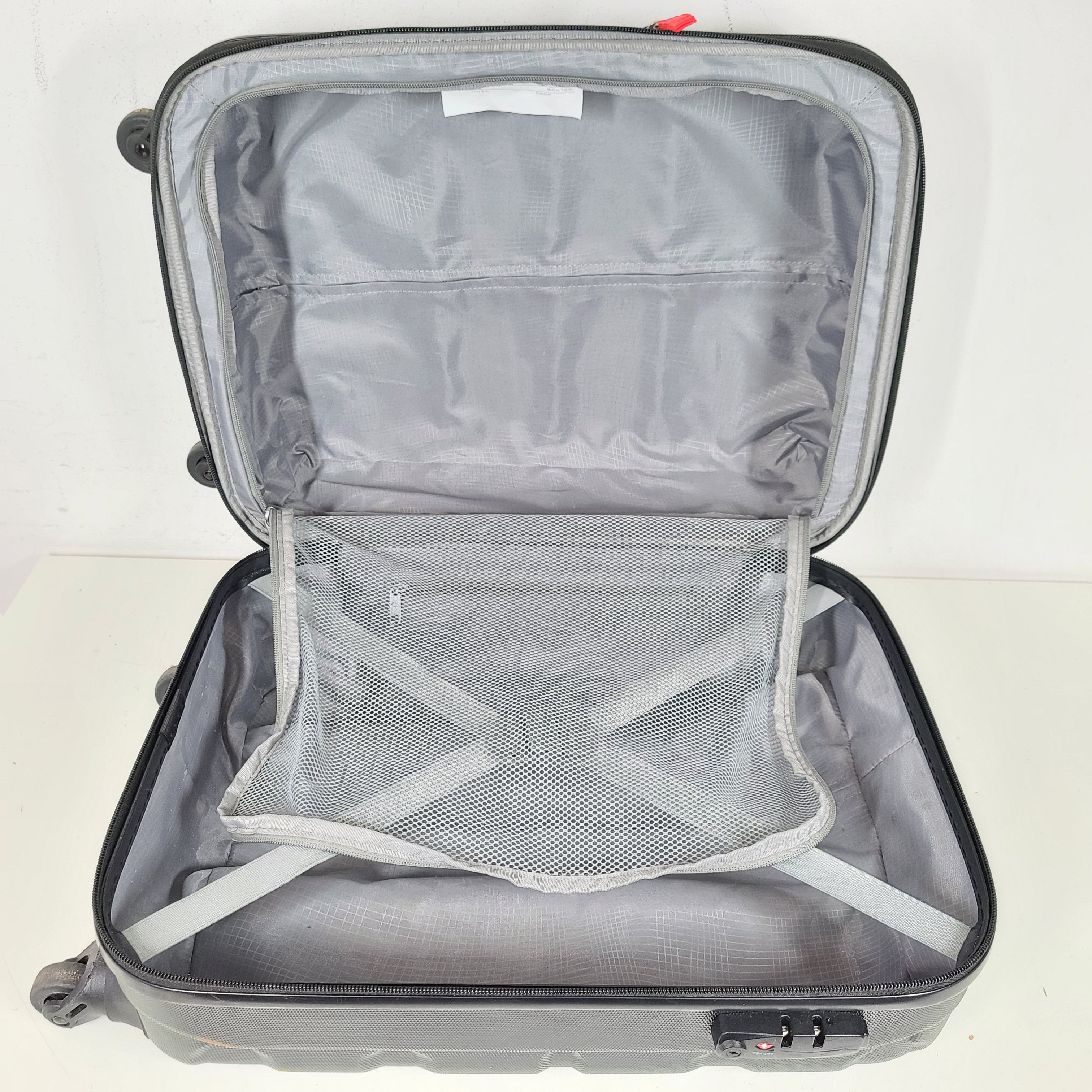 A black Samsonite spinner luggage.