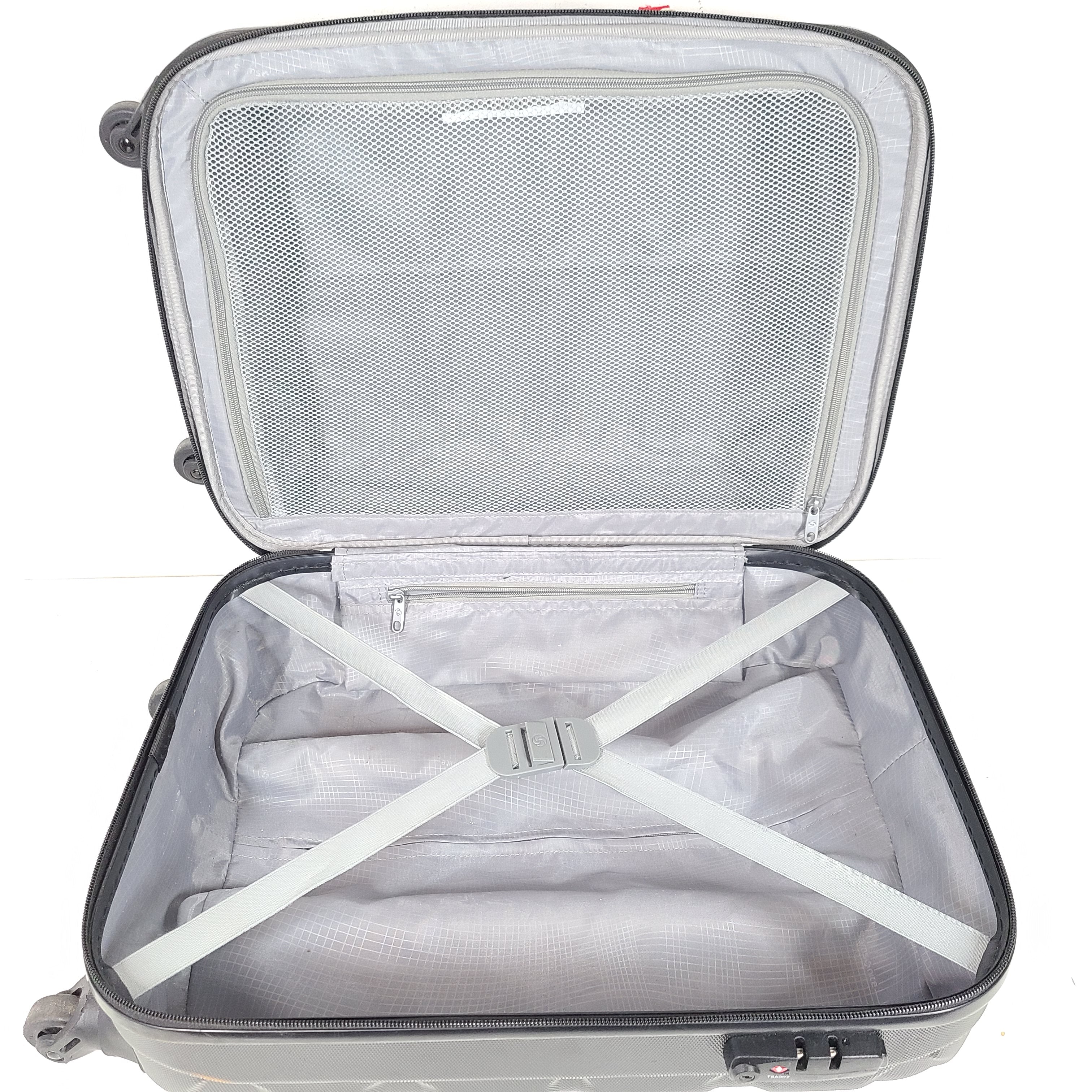 A black Samsonite spinner luggage.