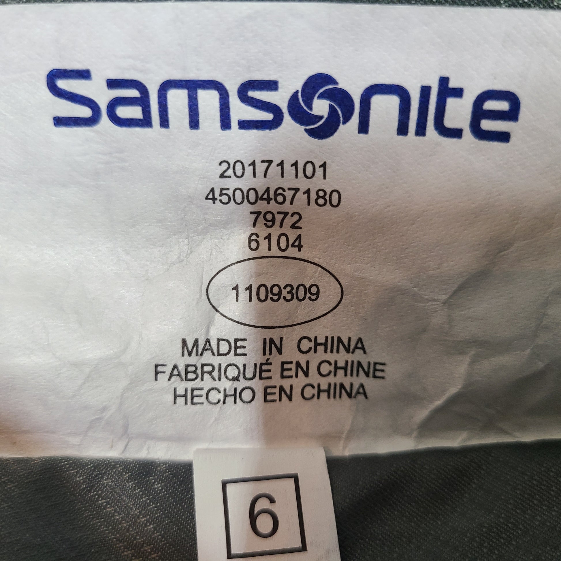 A stylish blue Samsonite spinner luggage