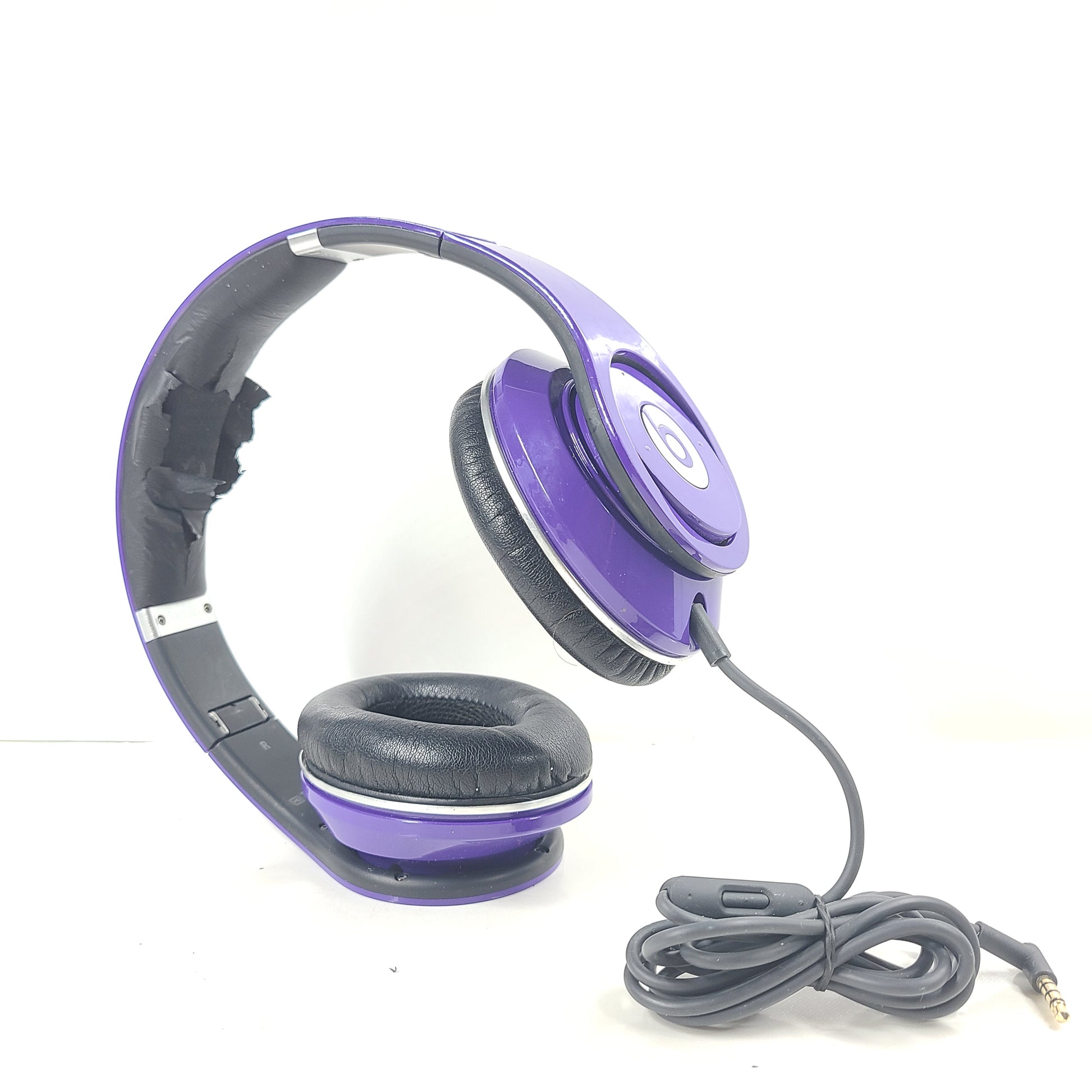 A pair of Beats by Dr. Dre Purple Wired Headphones B0501