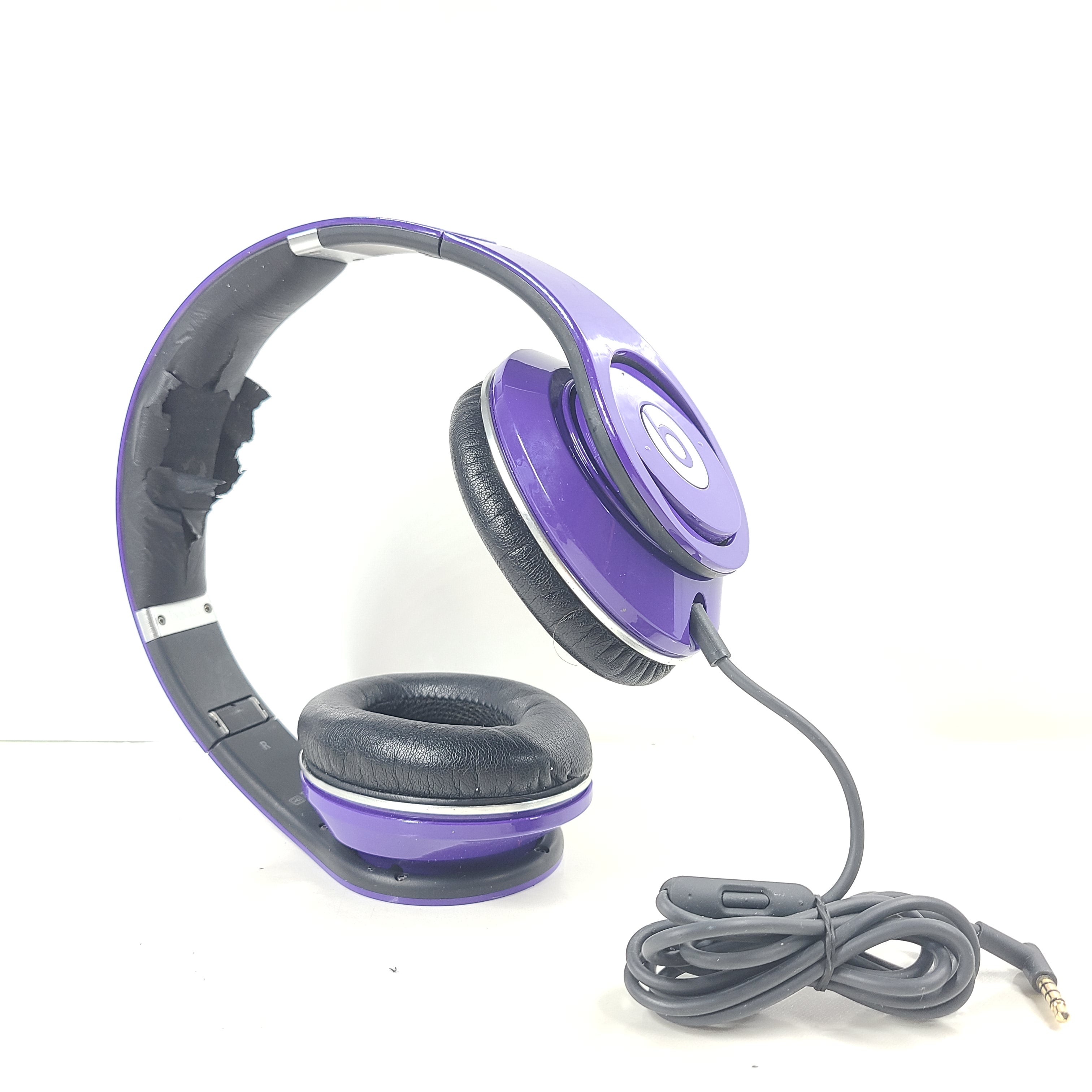 A pair of Beats by Dr. Dre Purple Wired Headphones B0501