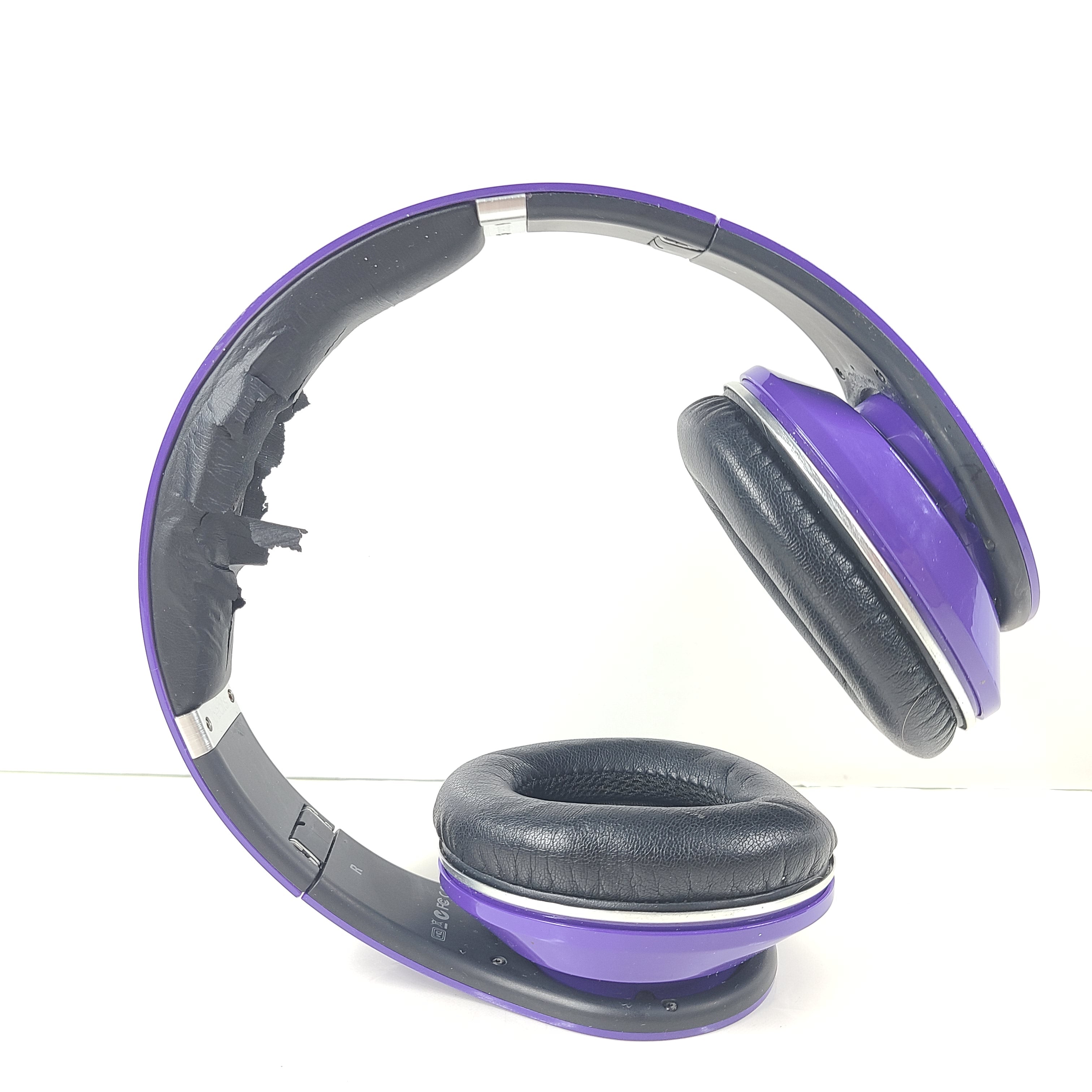 A pair of Beats by Dr. Dre Purple Wired Headphones B0501