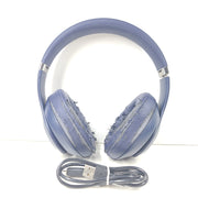 A pair of blue Beats wireless headphones.