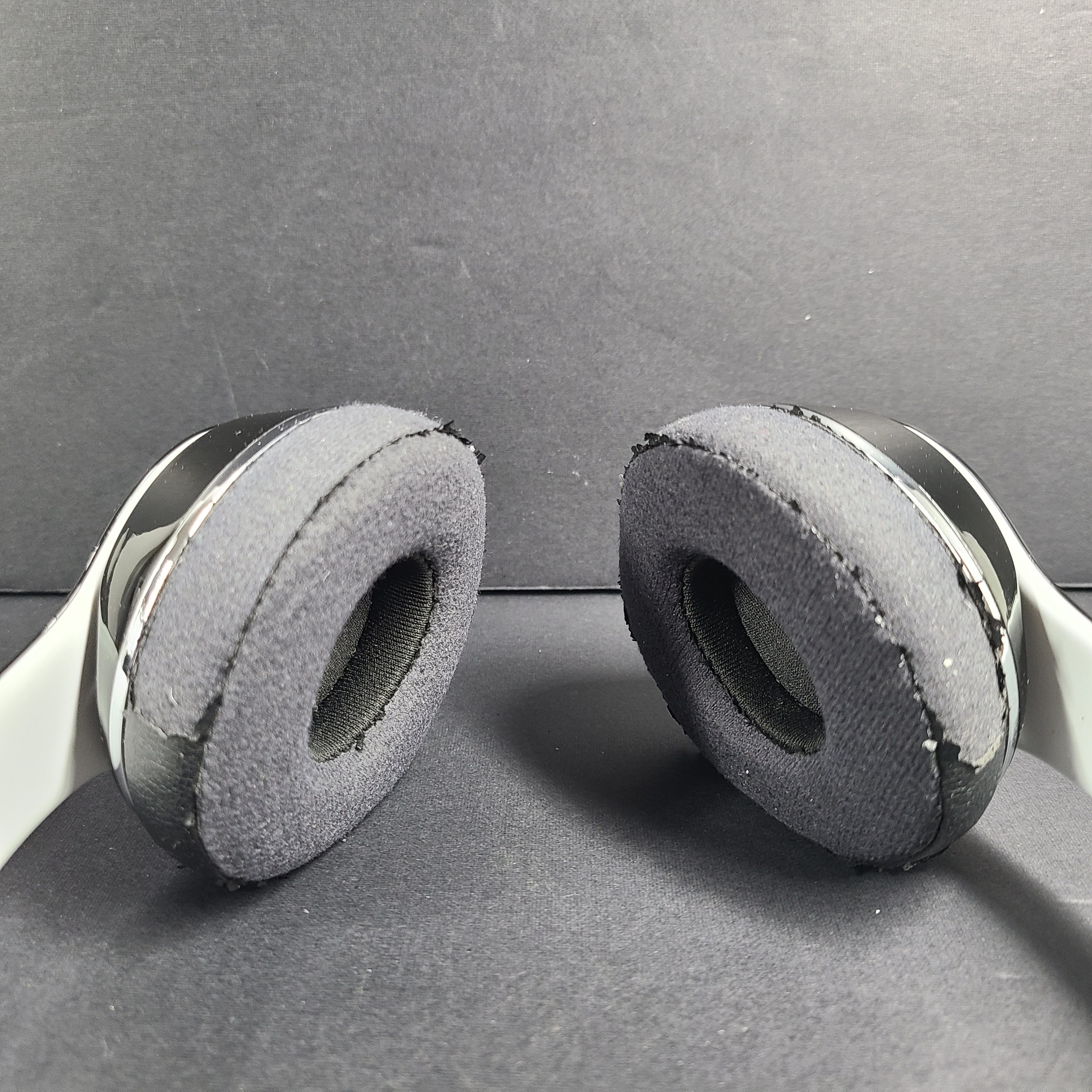 A pair of Beats Solo Wired Headphones with a red cable