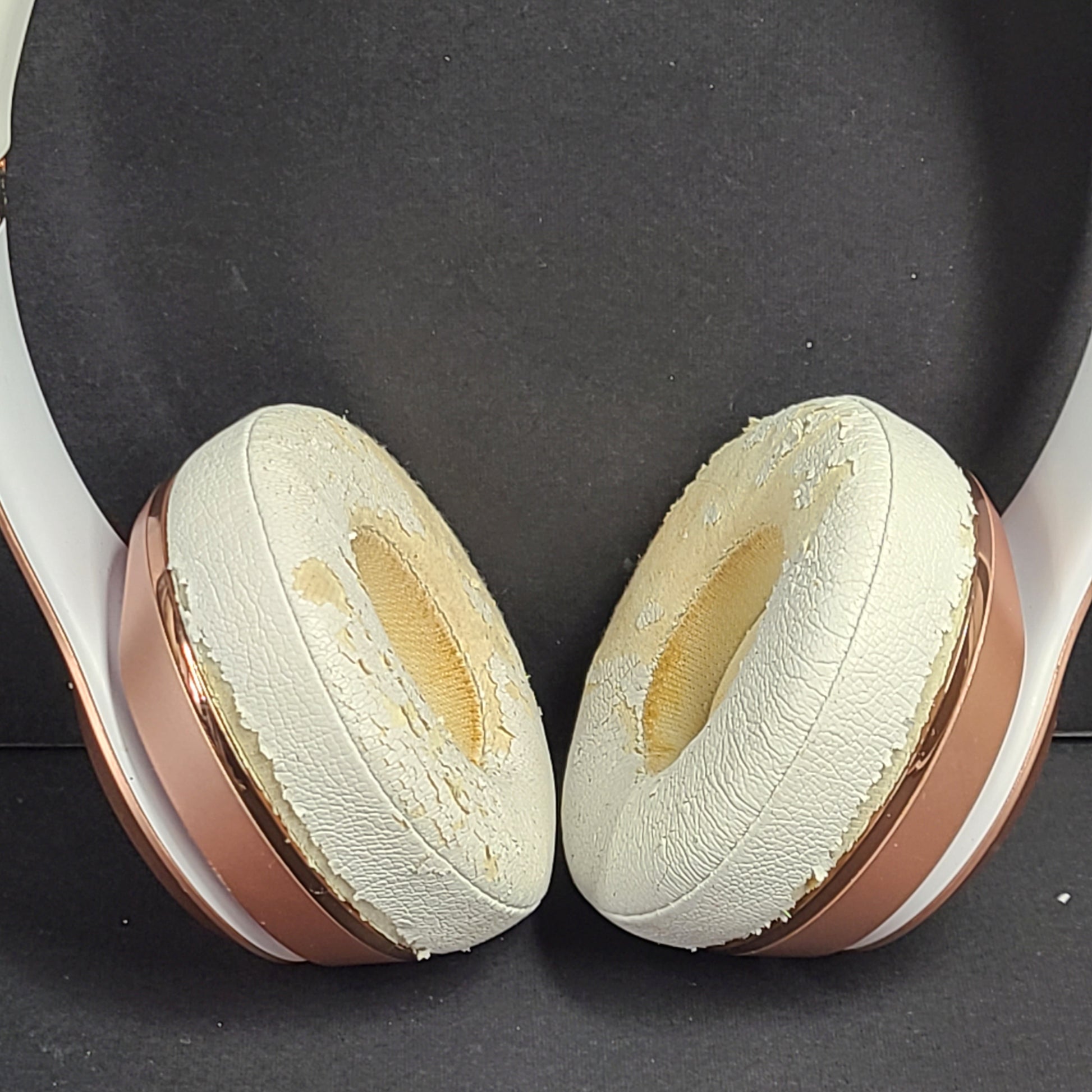 A stylish rose gold on-ear headphones by Beats Solo3 Wireless.