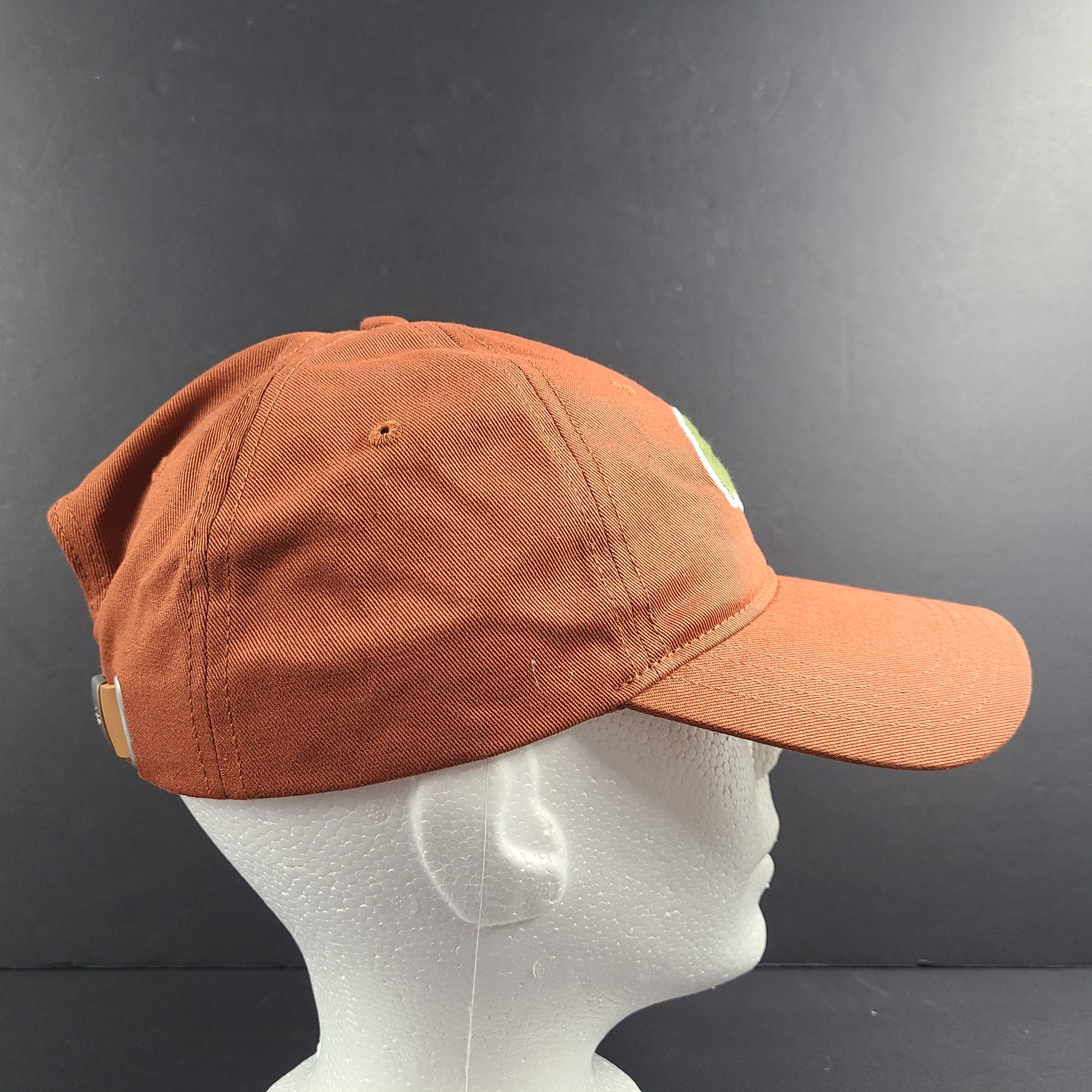 A stylish Lacoste baseball cap in brown color.