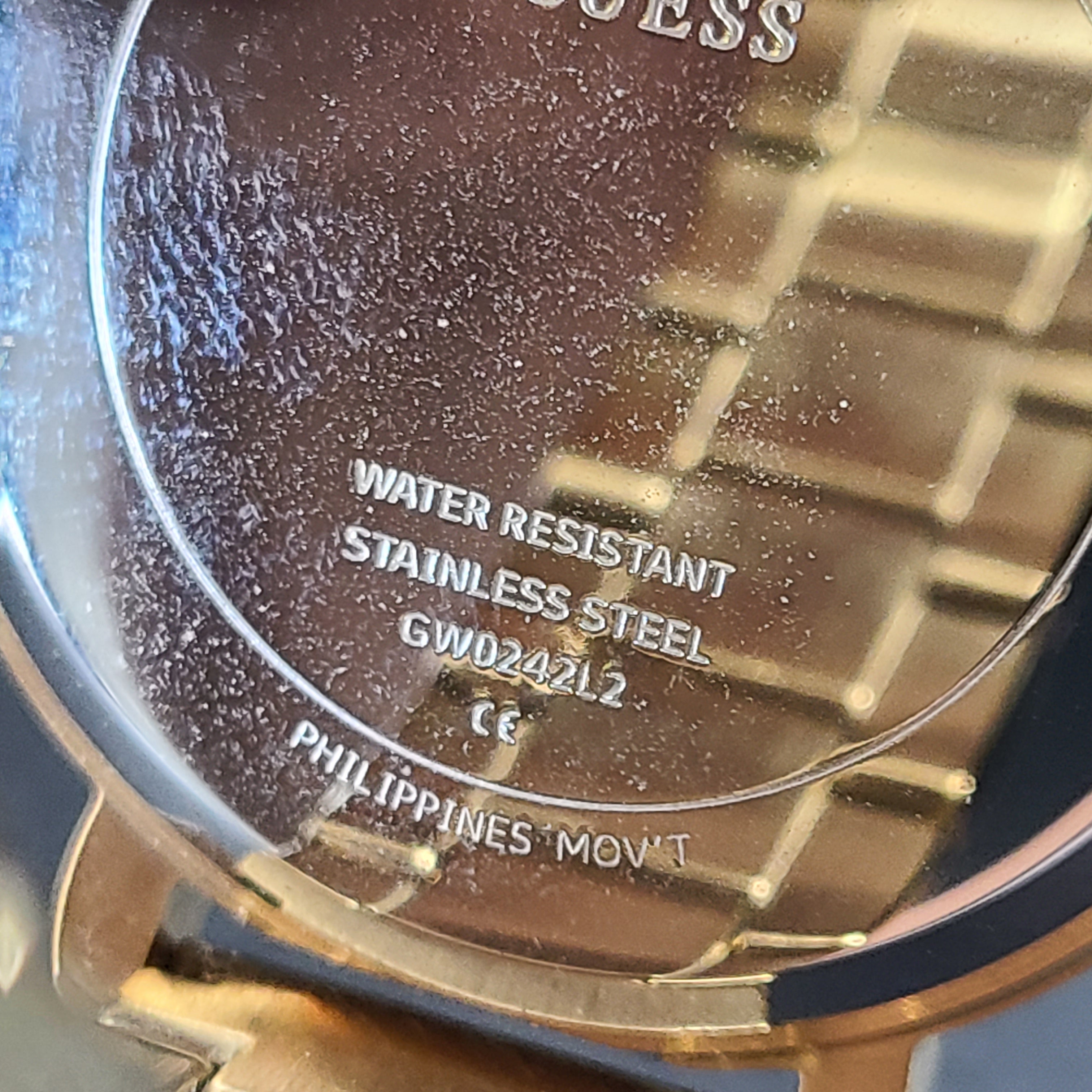 A stylish Guess rose gold-tone stainless steel women's watch.