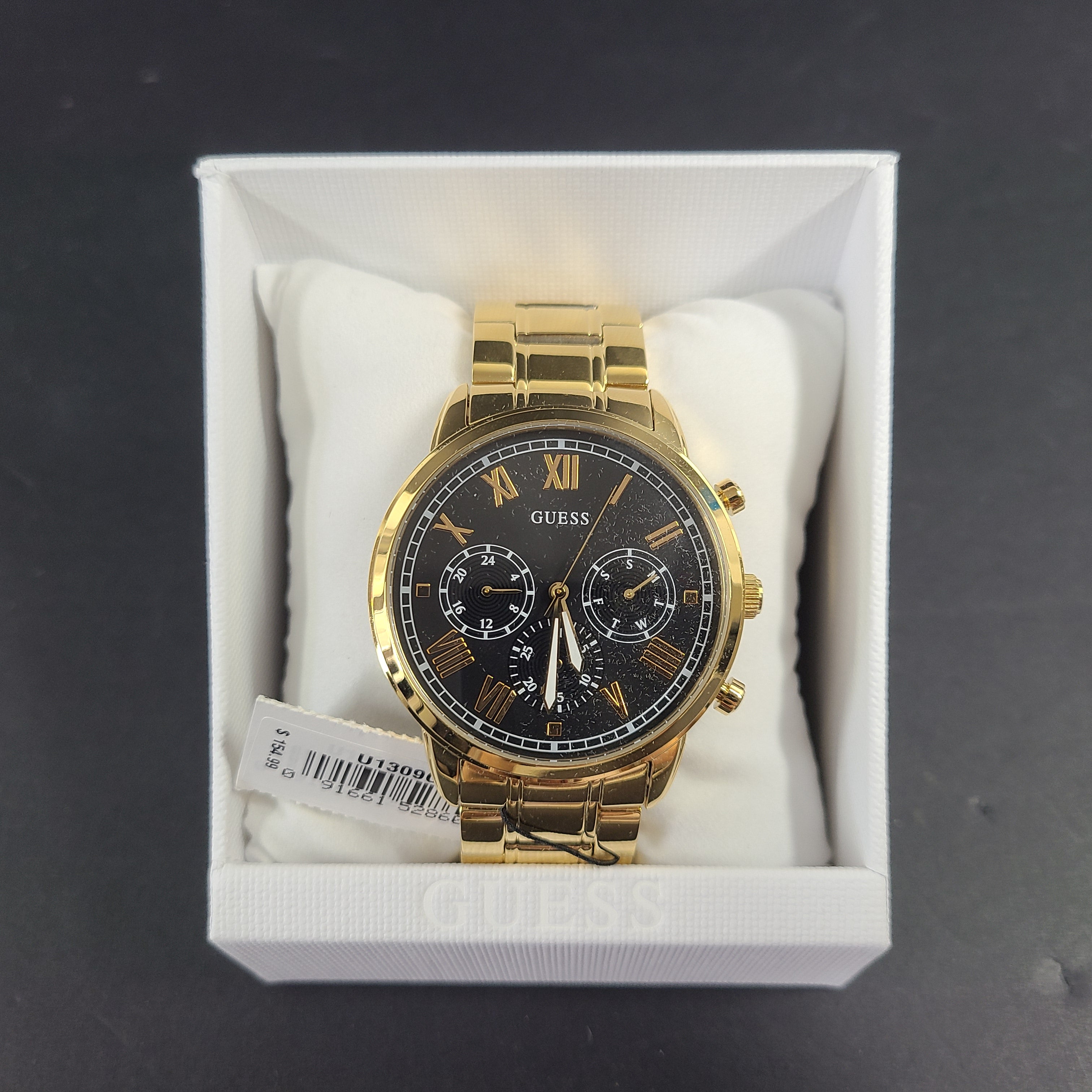 A stylish men's gold-tone stainless steel chronograph watch by GUESS.