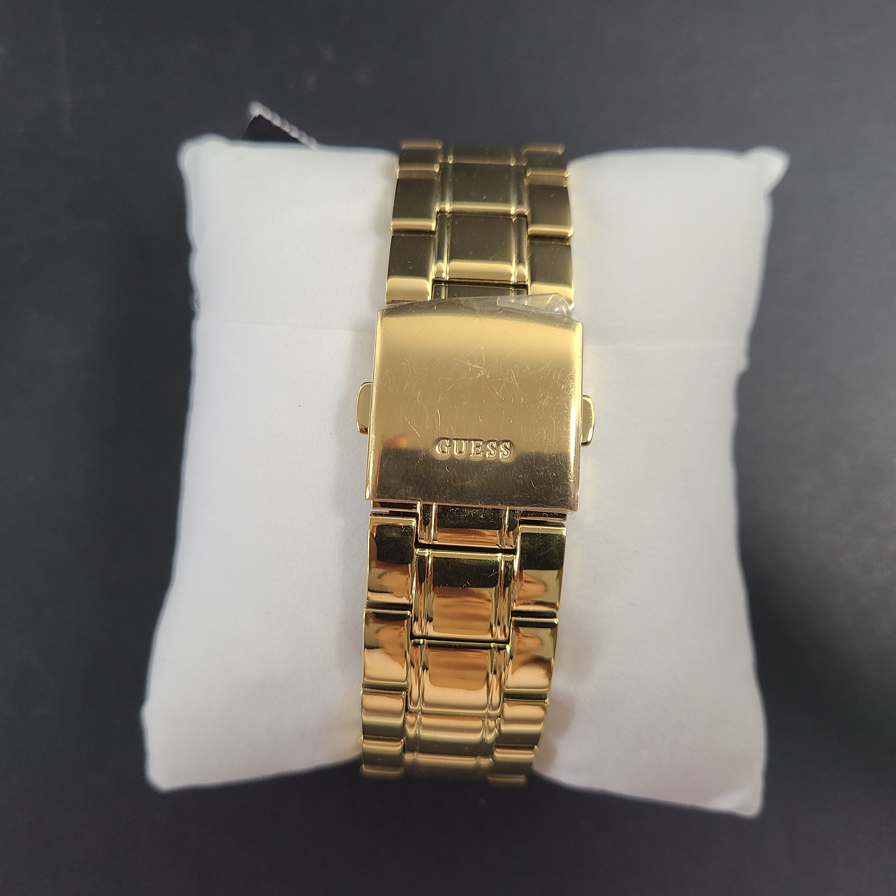 A stylish men's gold-tone stainless steel chronograph watch by GUESS.