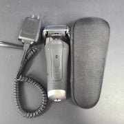A Braun Series 5 Electric Shaver in pre-owned condition with charging cord.