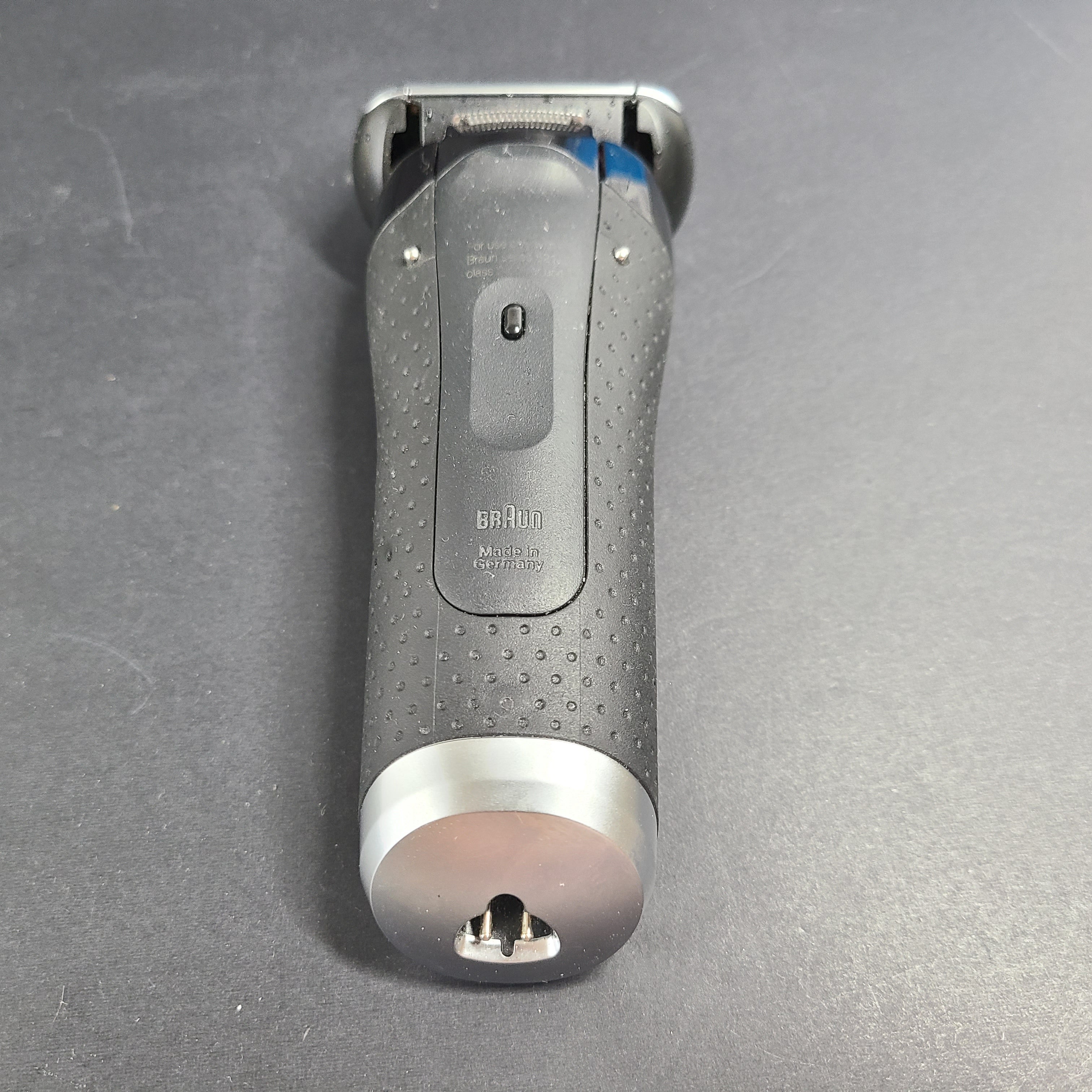 A Braun Series 5 Electric Shaver in pre-owned condition with charging cord.