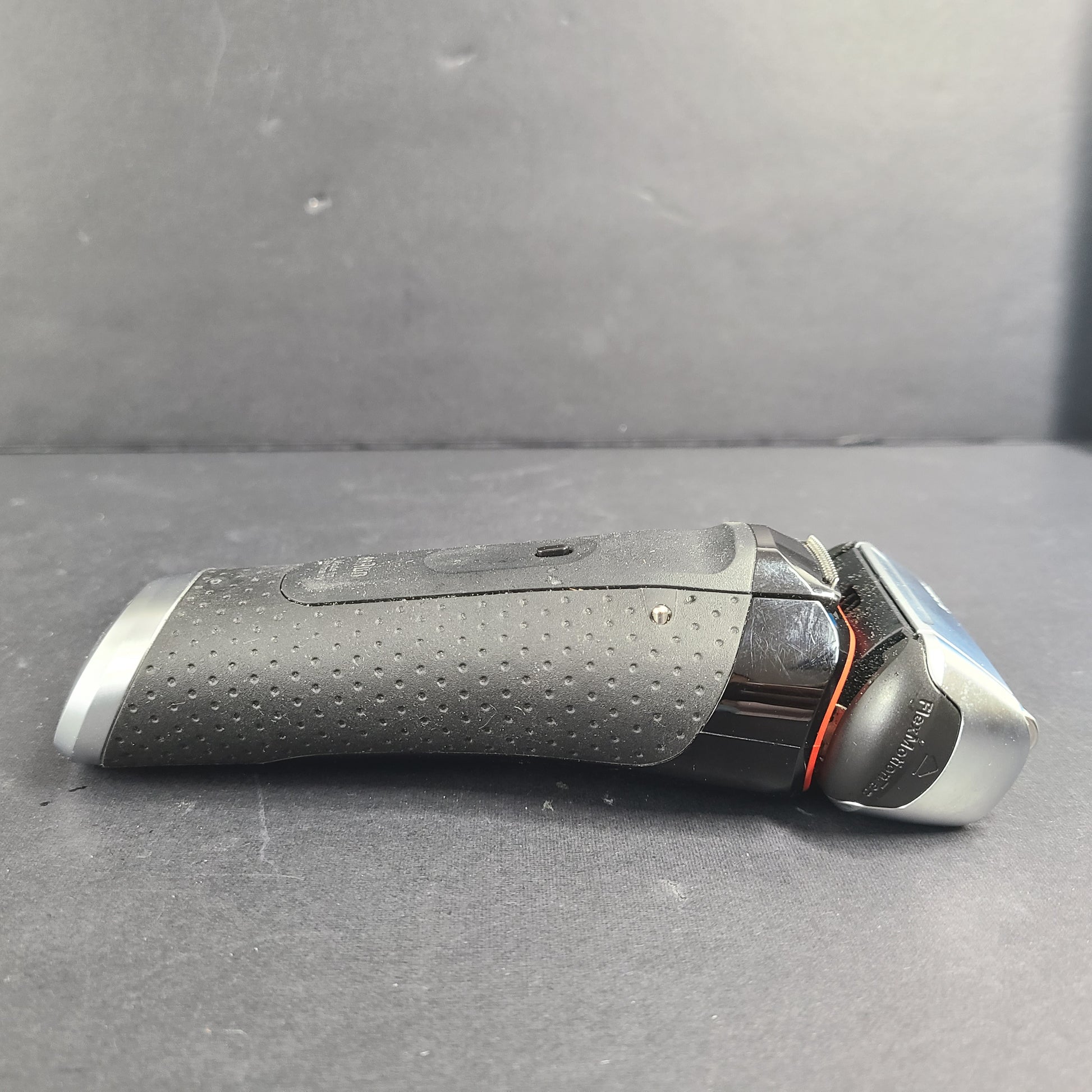 A Braun Series 5 Electric Shaver in pre-owned condition with charging cord.